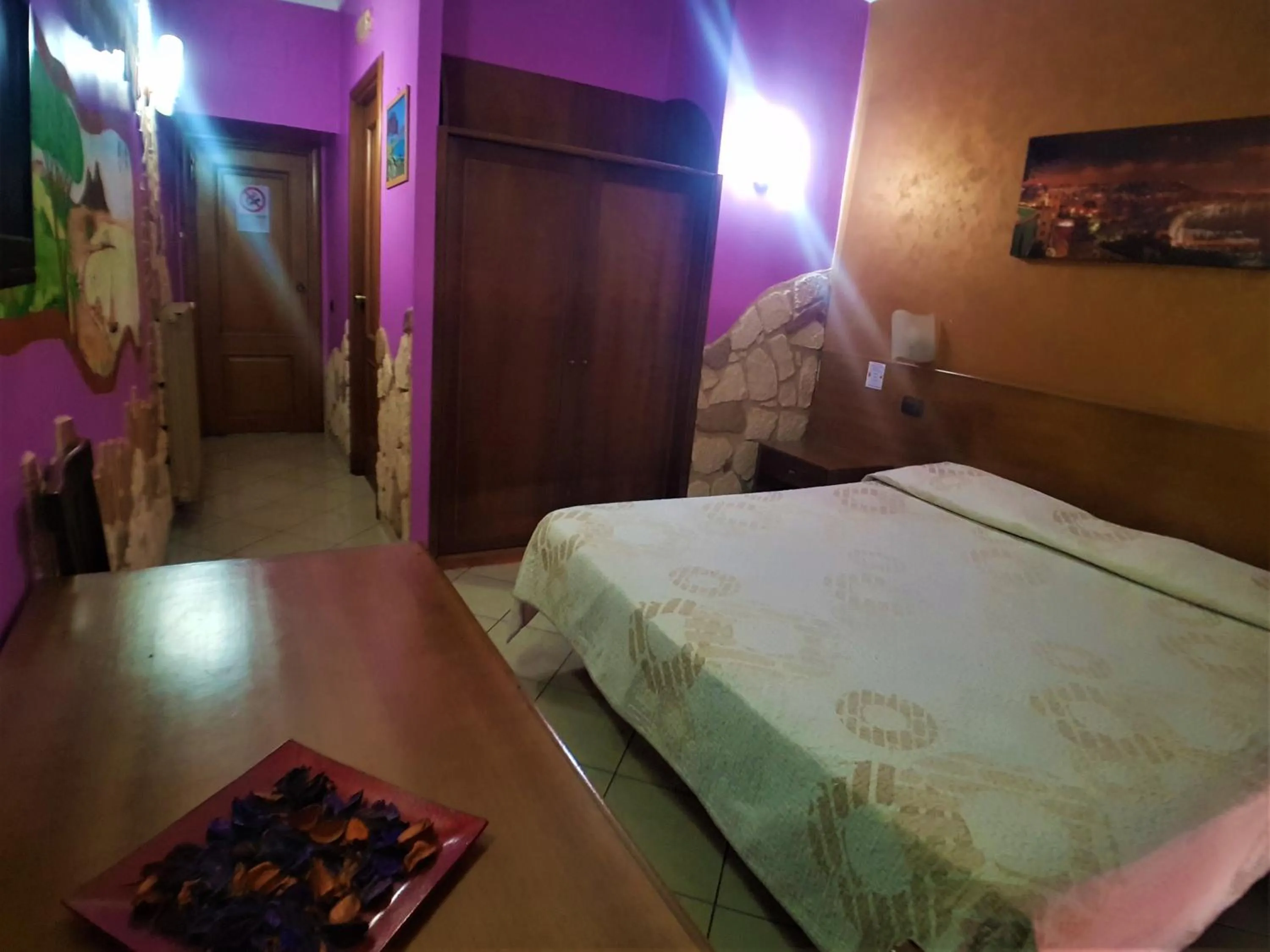 Bed in Hotel Ginevra