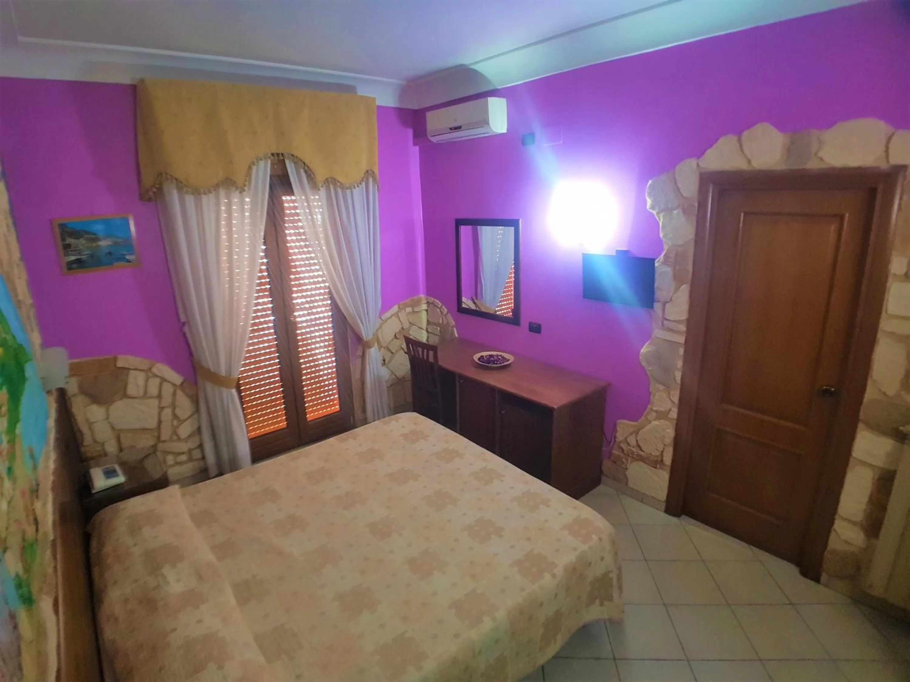 Bed in Hotel Ginevra