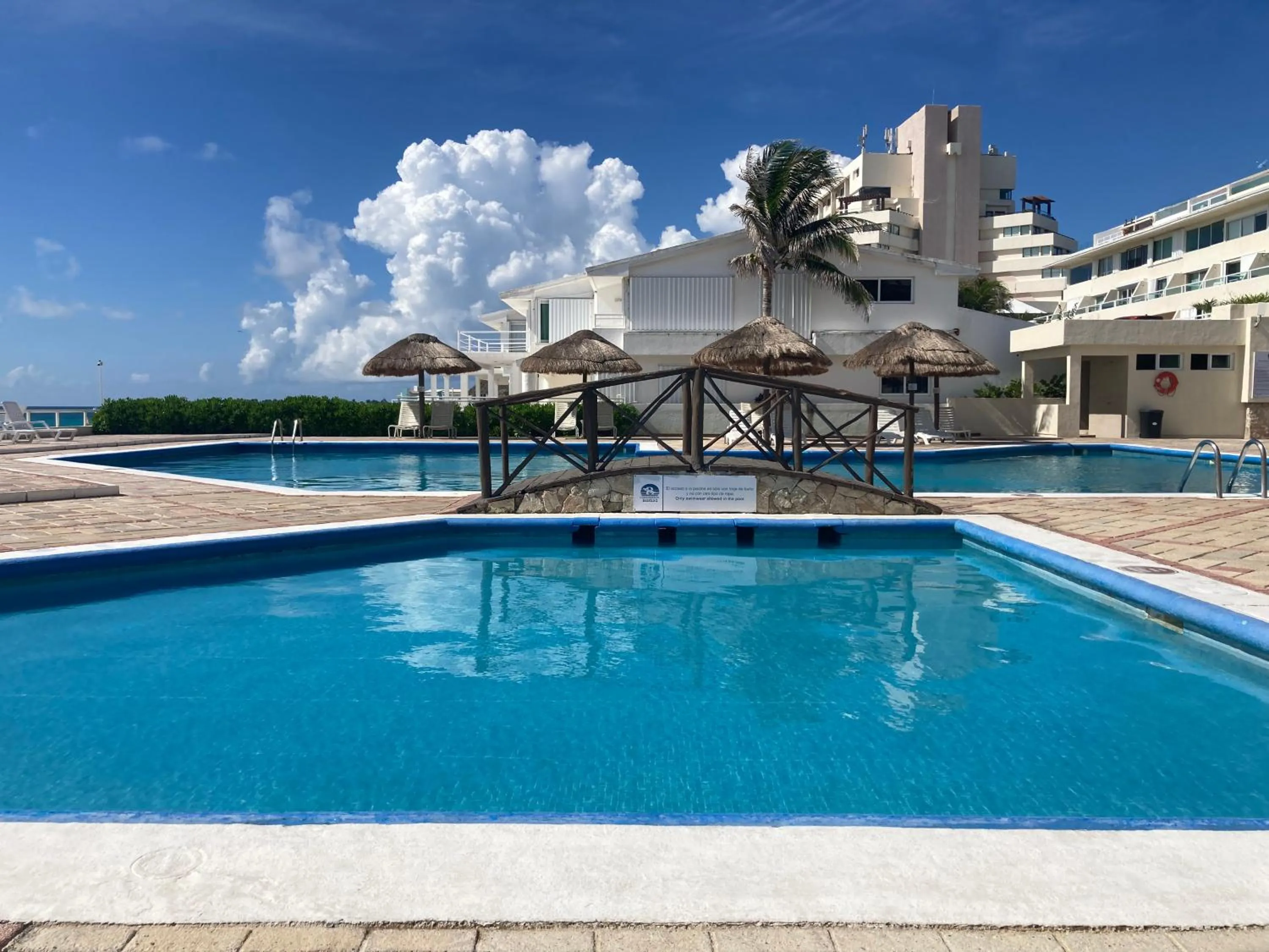 Swimming pool in Cancun Oceanfront, Entire Apartment
