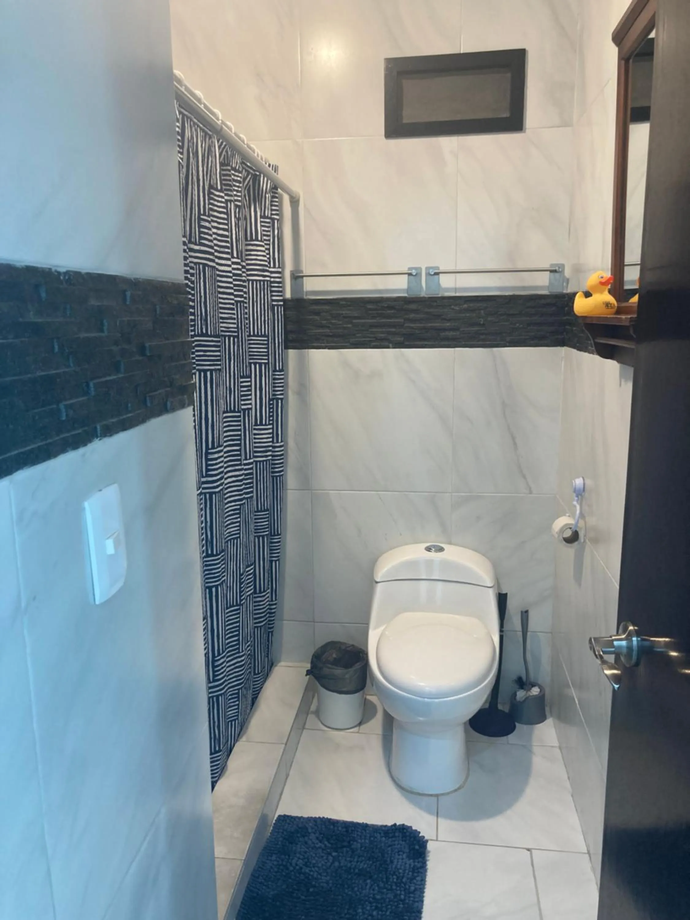 Toilet in Cancun Oceanfront, Entire Apartment