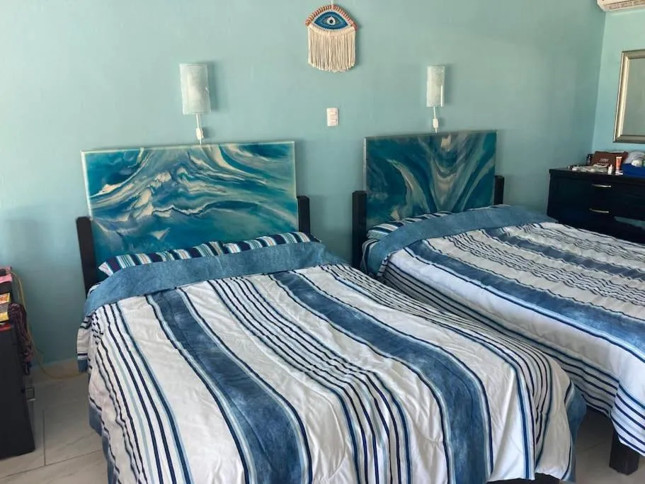 Bed in Cancun Oceanfront, Entire Apartment