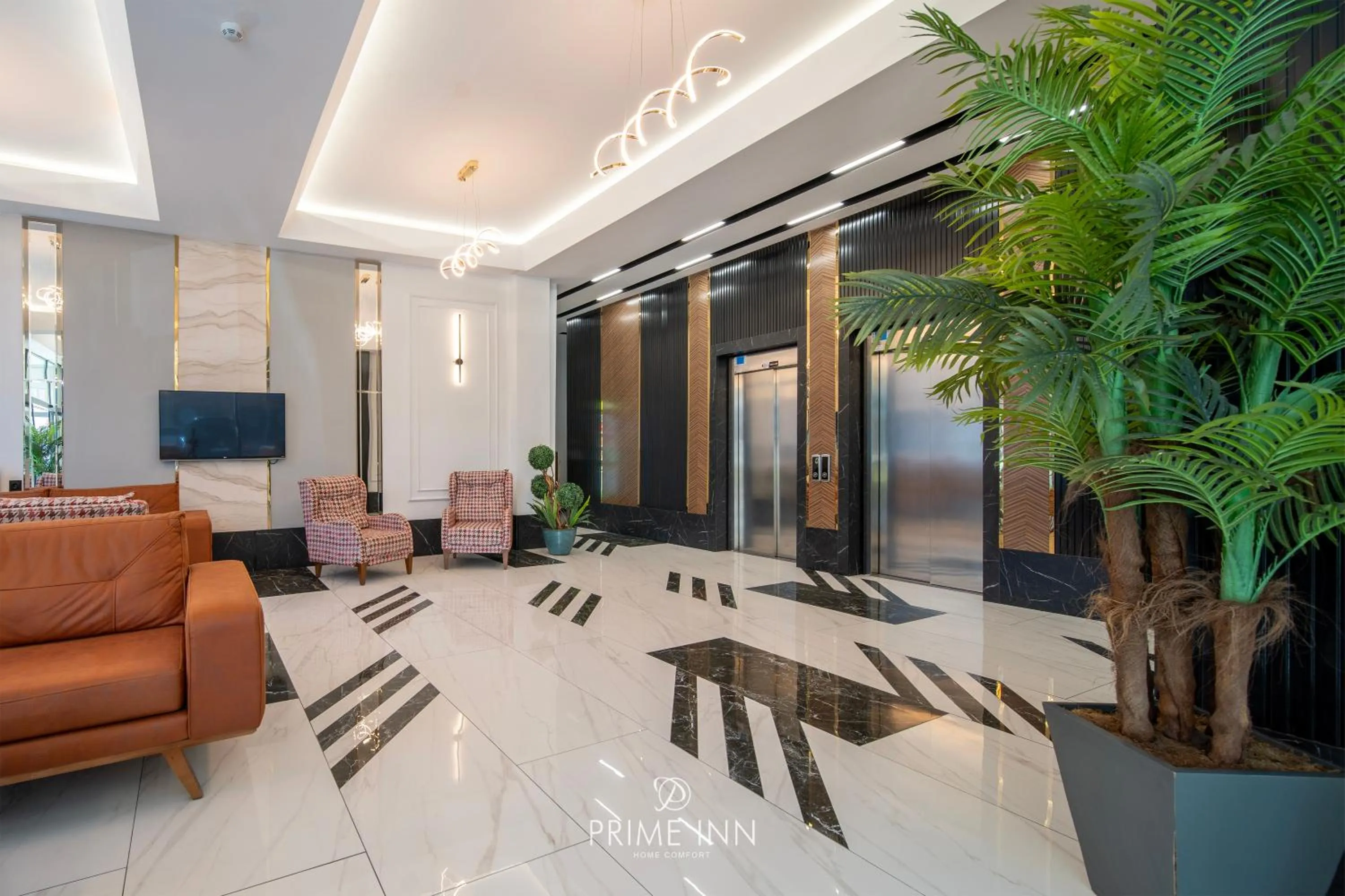 Communal lounge/ TV room in PRIME INN CITY