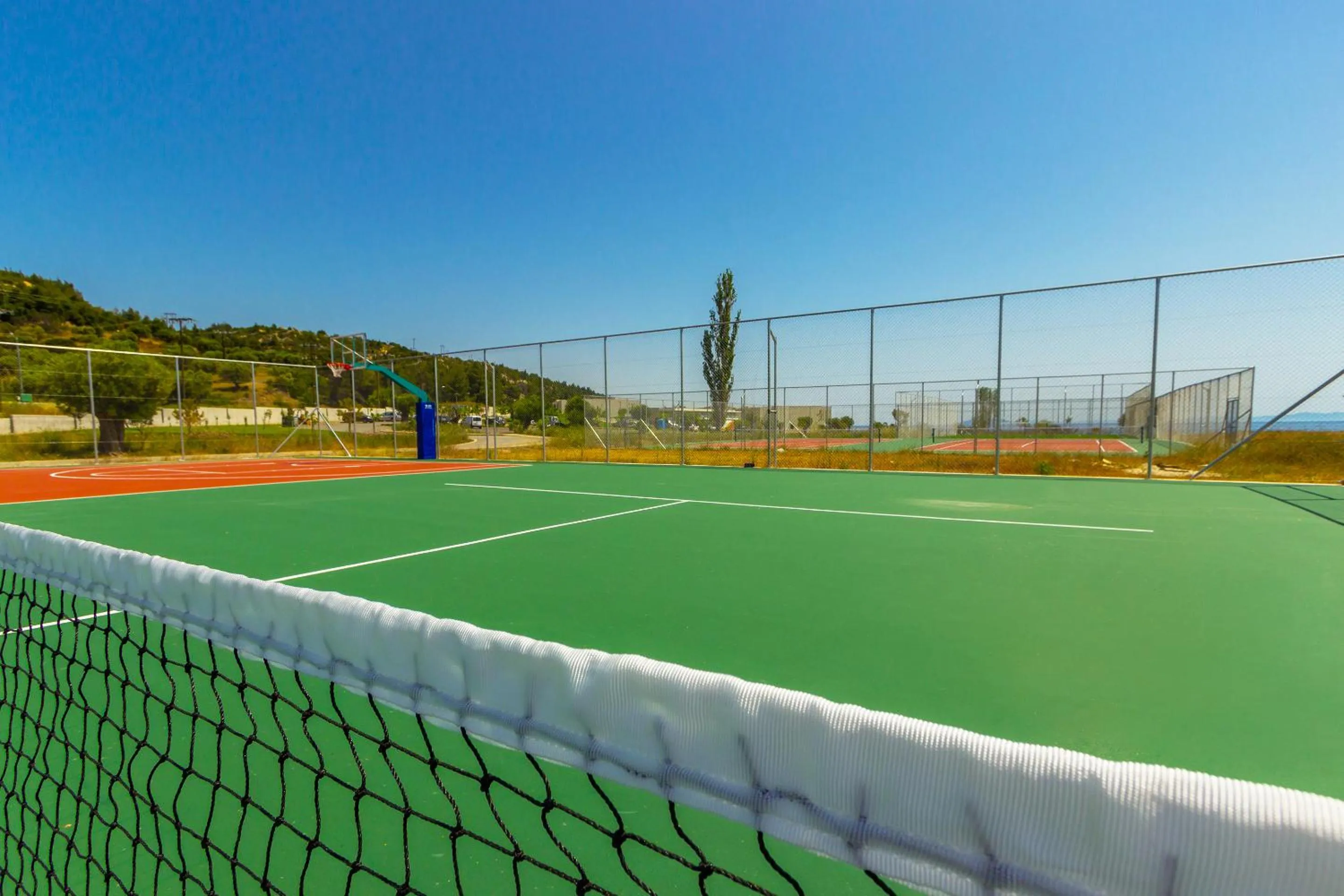 Tennis court in Ammoa Luxury Hotel & Spa Resort
