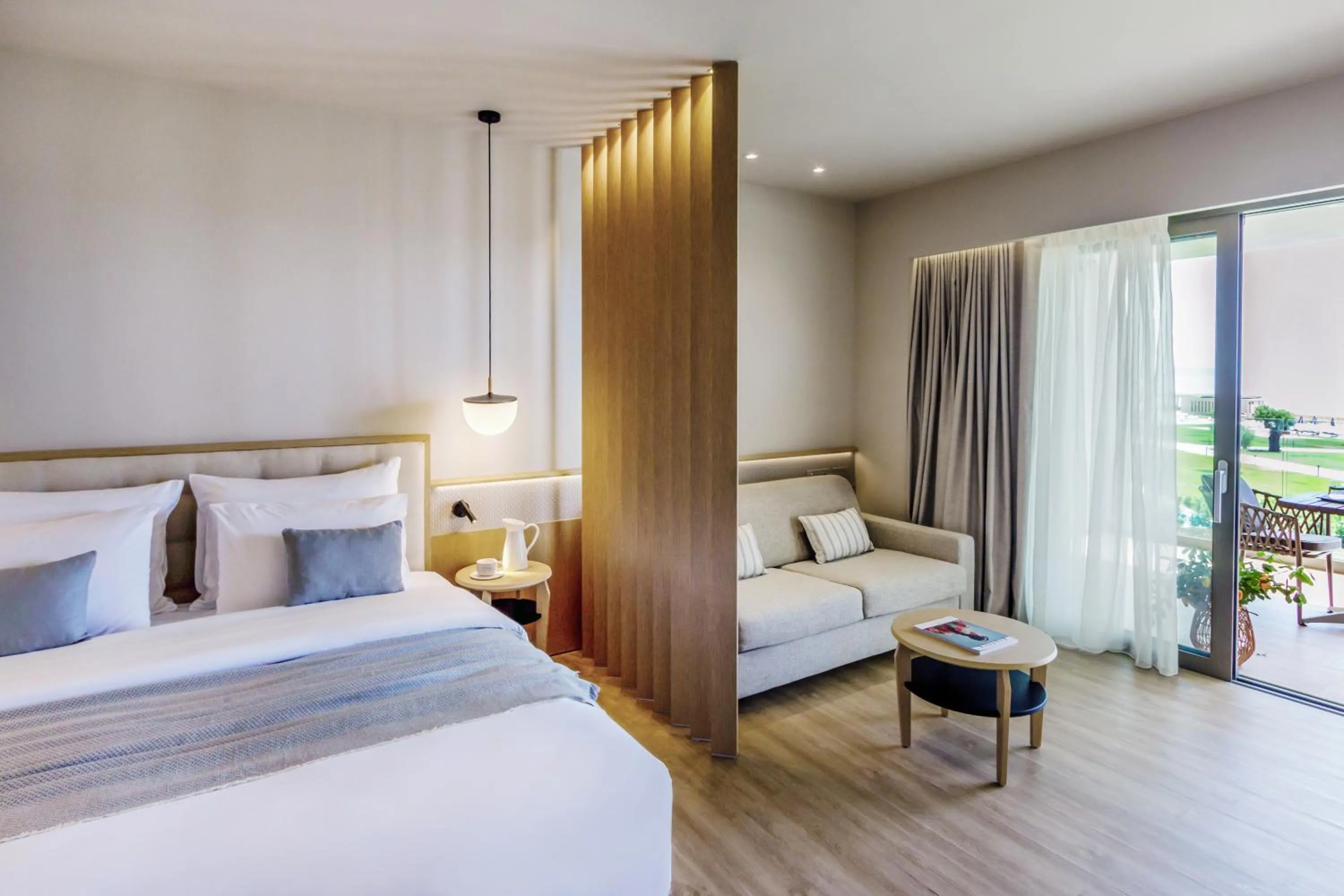 Photo of the whole room, Bed in Ammoa Luxury Hotel & Spa Resort