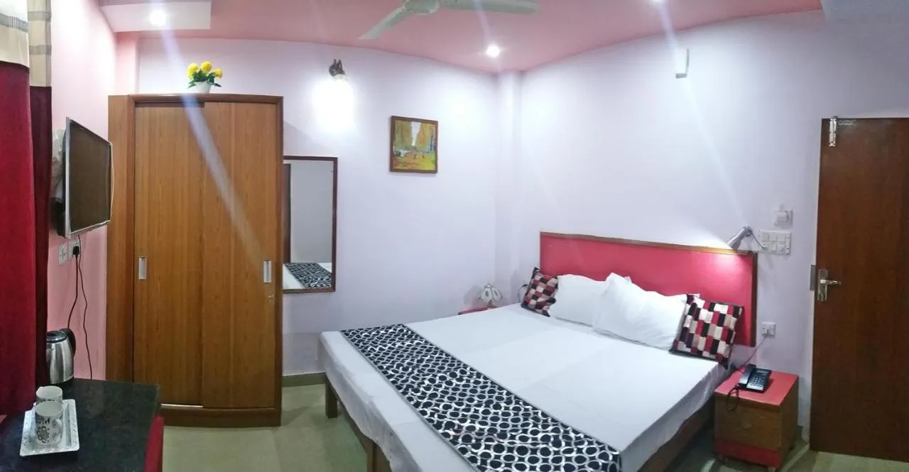 Bed in AIRPORT SKY INN HOMESTAY