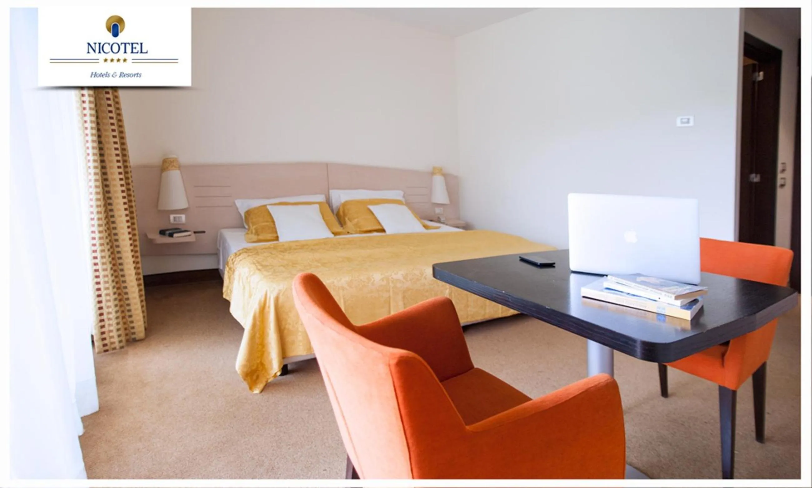 Seating area in Nicotel Pineto