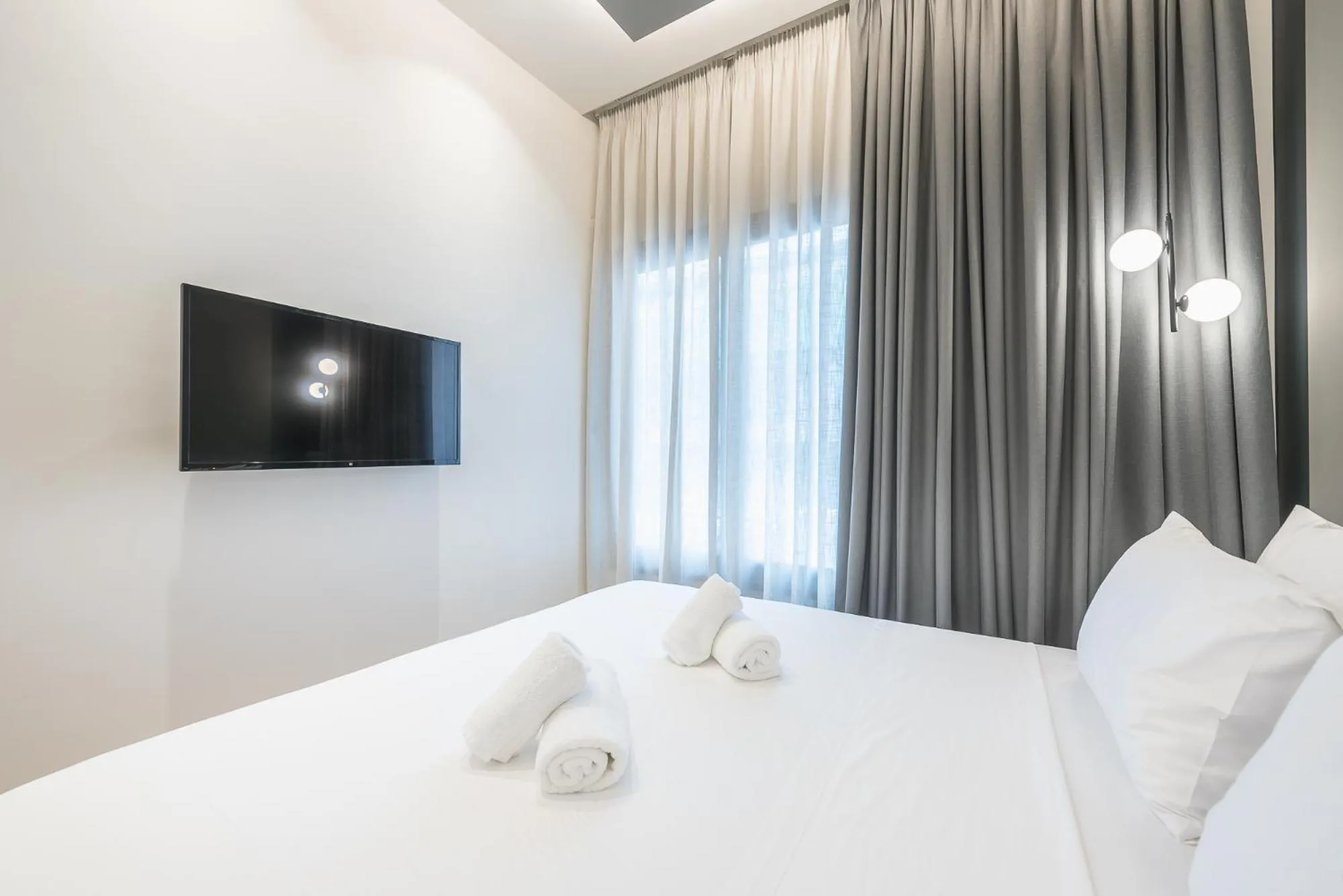 Bed in The Asprogeraka - self check-in rooms