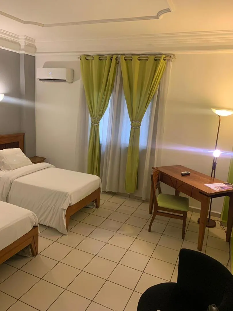 Bed in Futuris Hotel