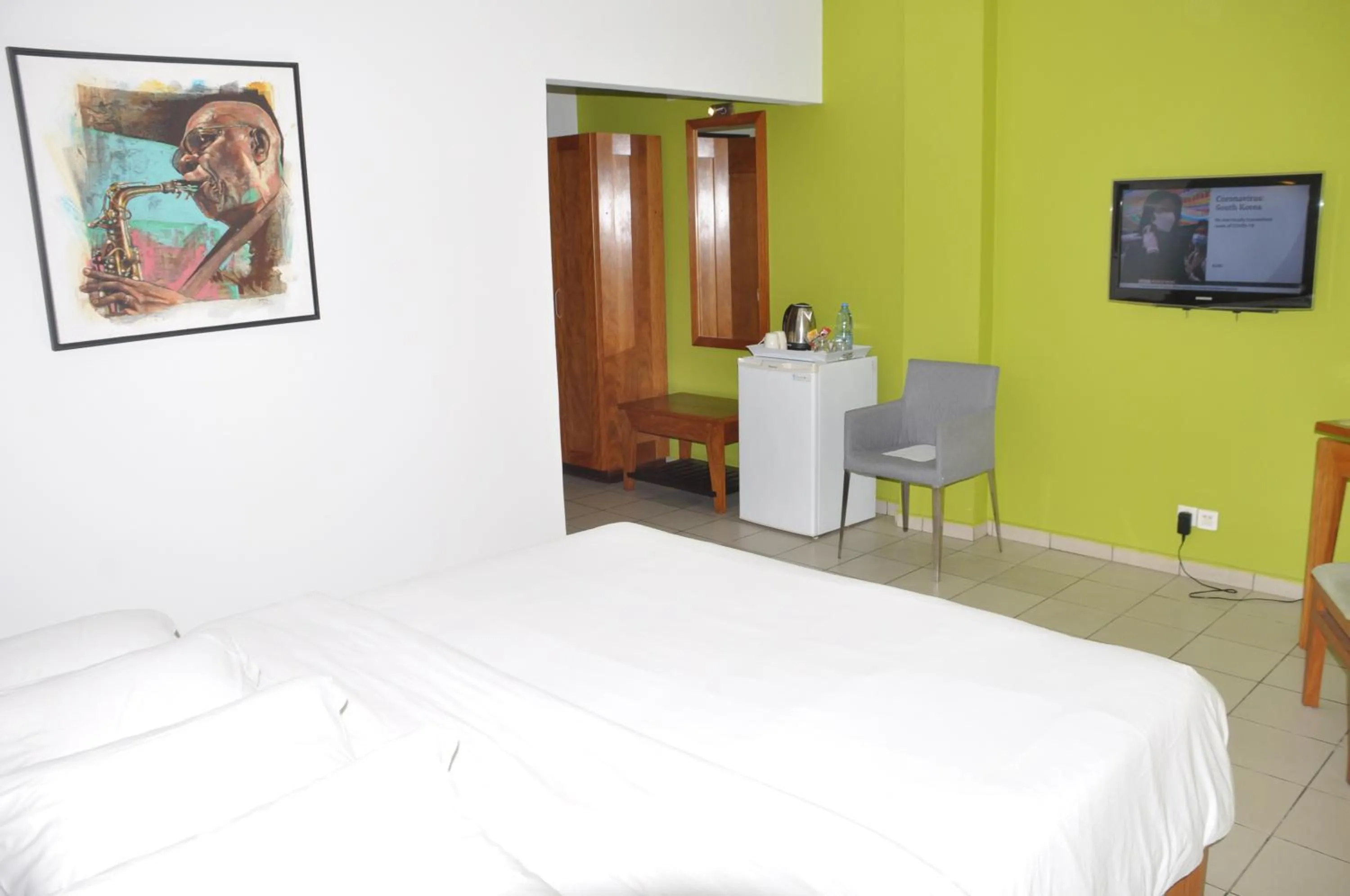 Bed in Futuris Hotel