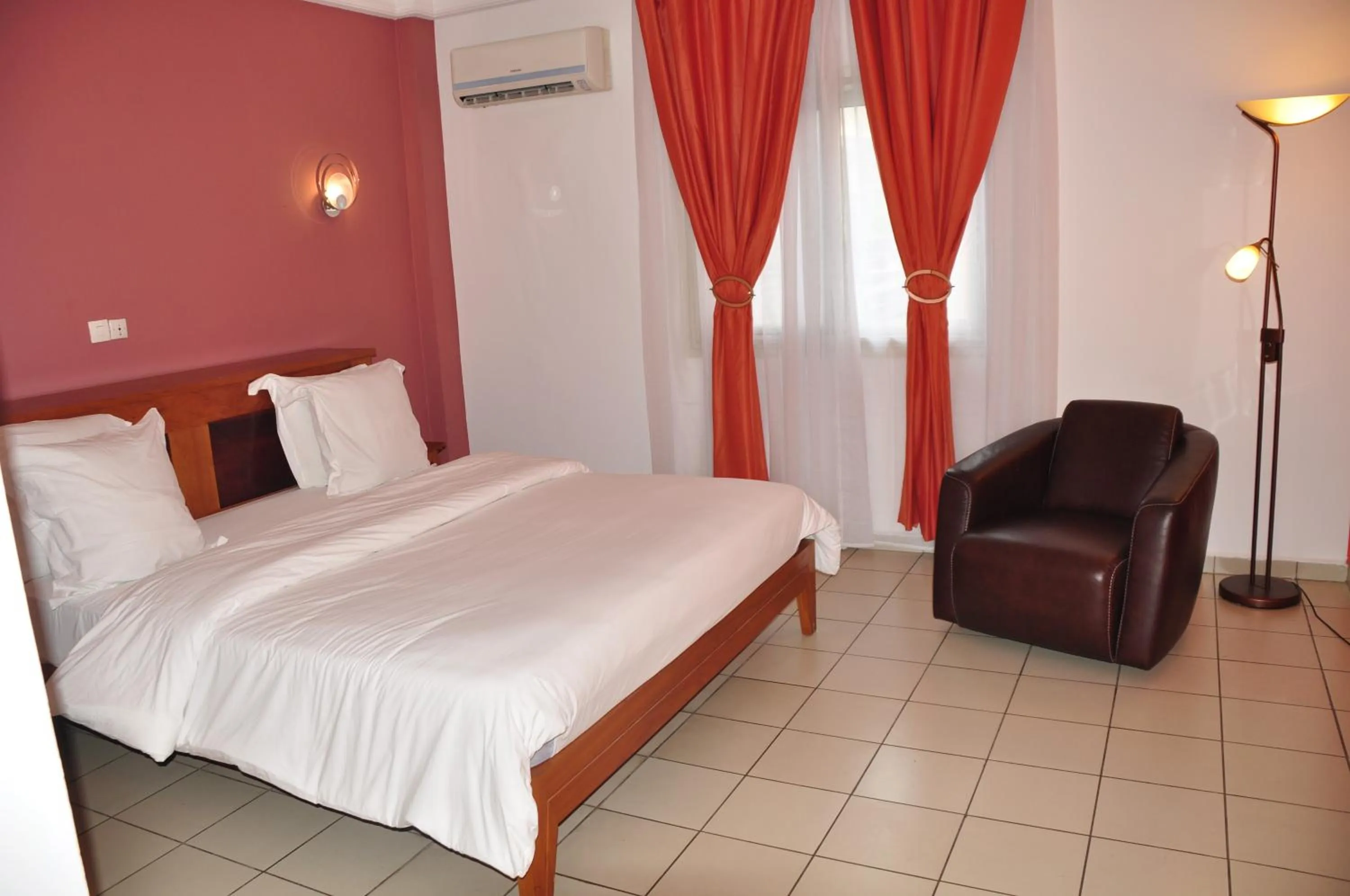 Bed in Futuris Hotel