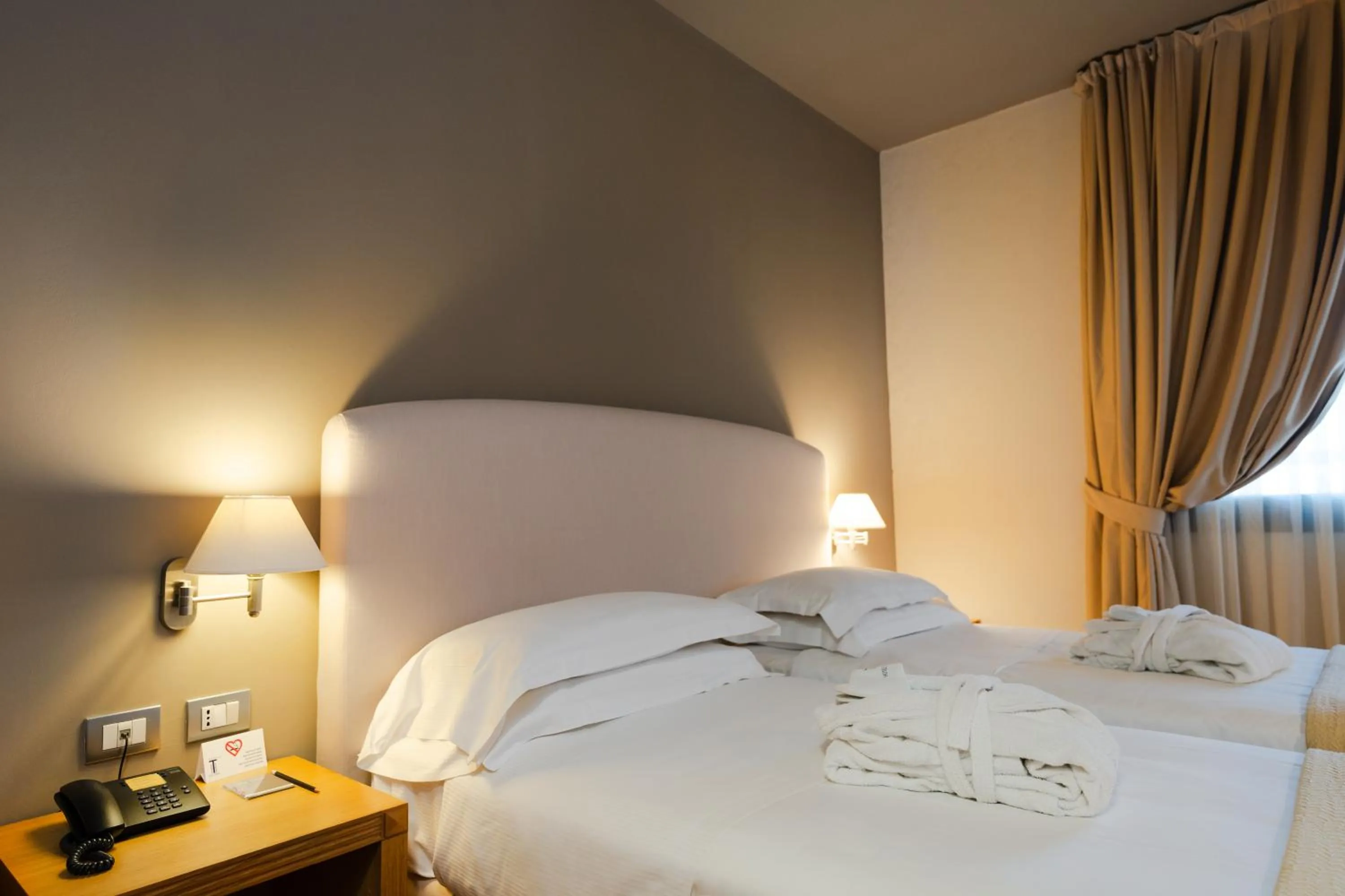 Bed in Hotel Touring