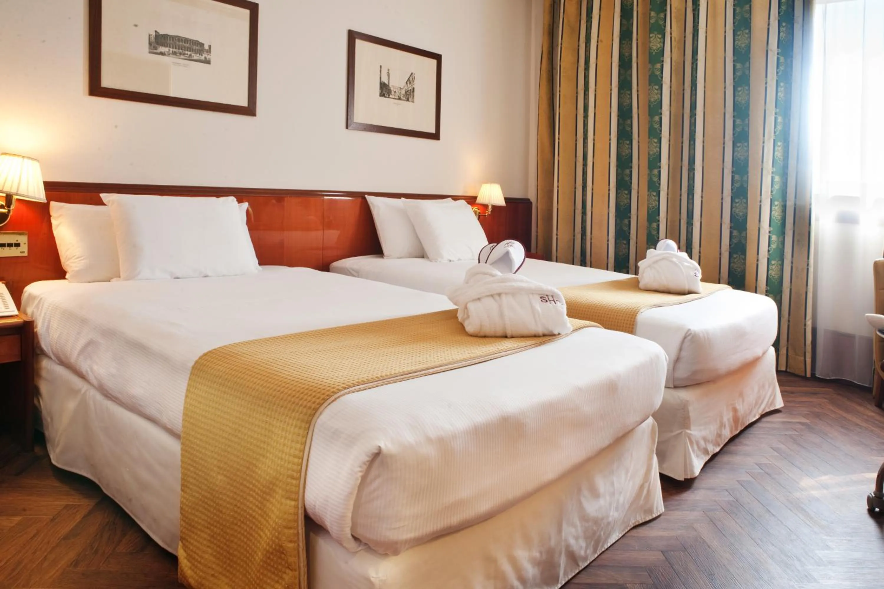 Bed in Hotel Catullo