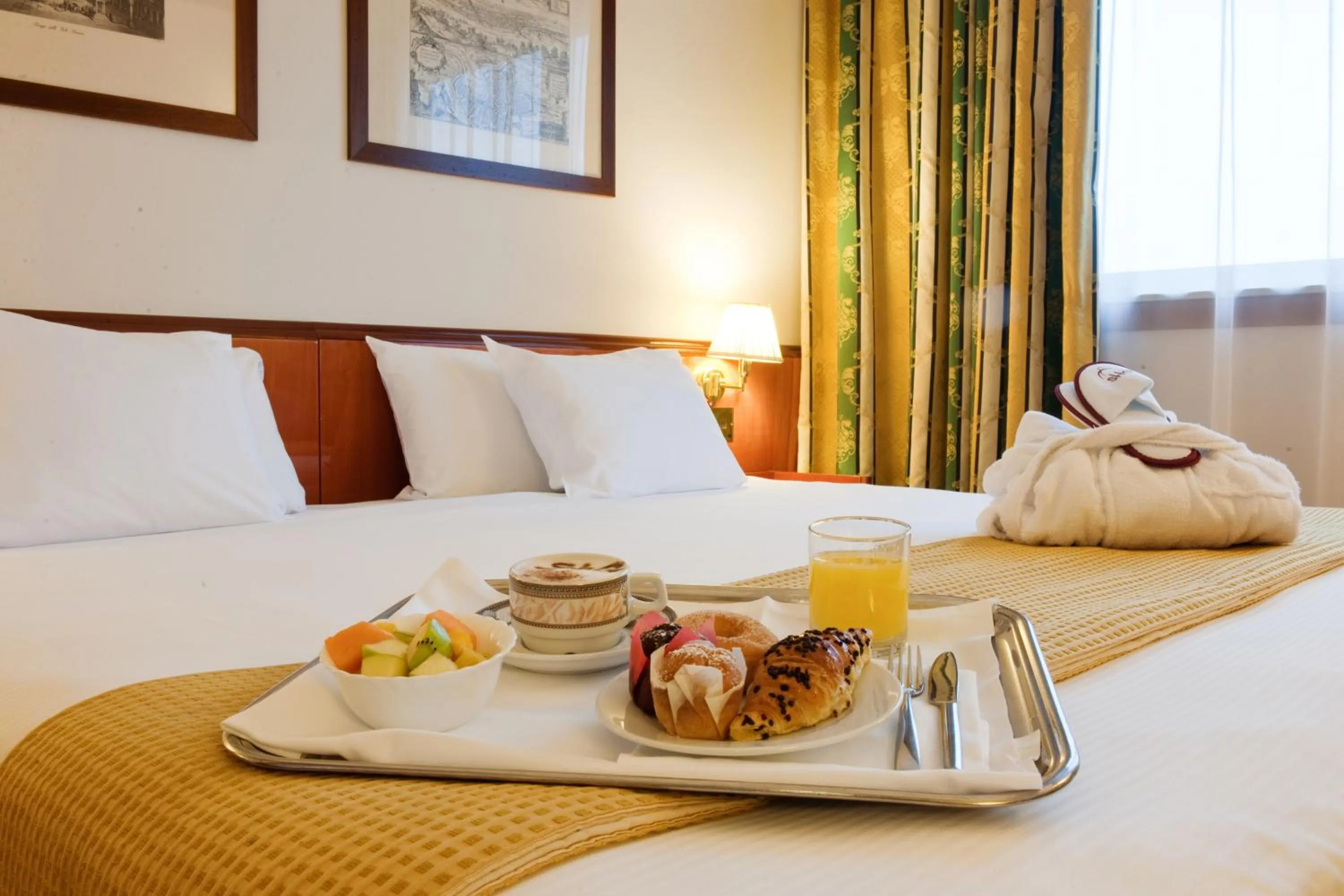 Bed in Hotel Catullo