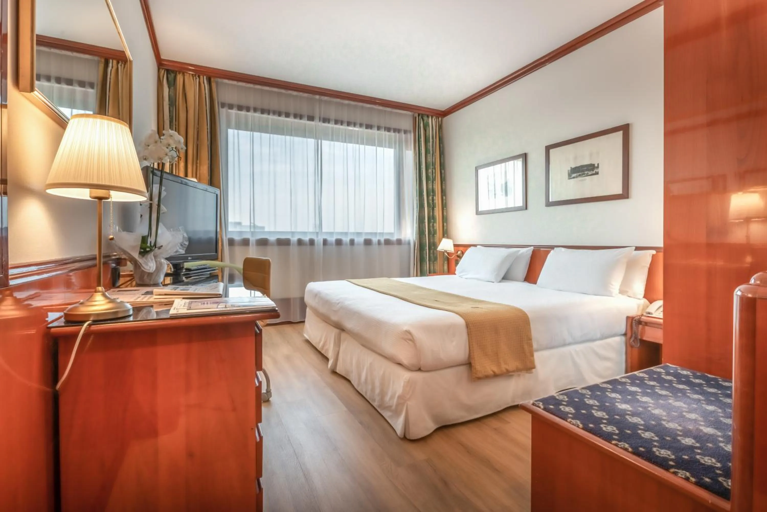 Bed in Hotel Catullo