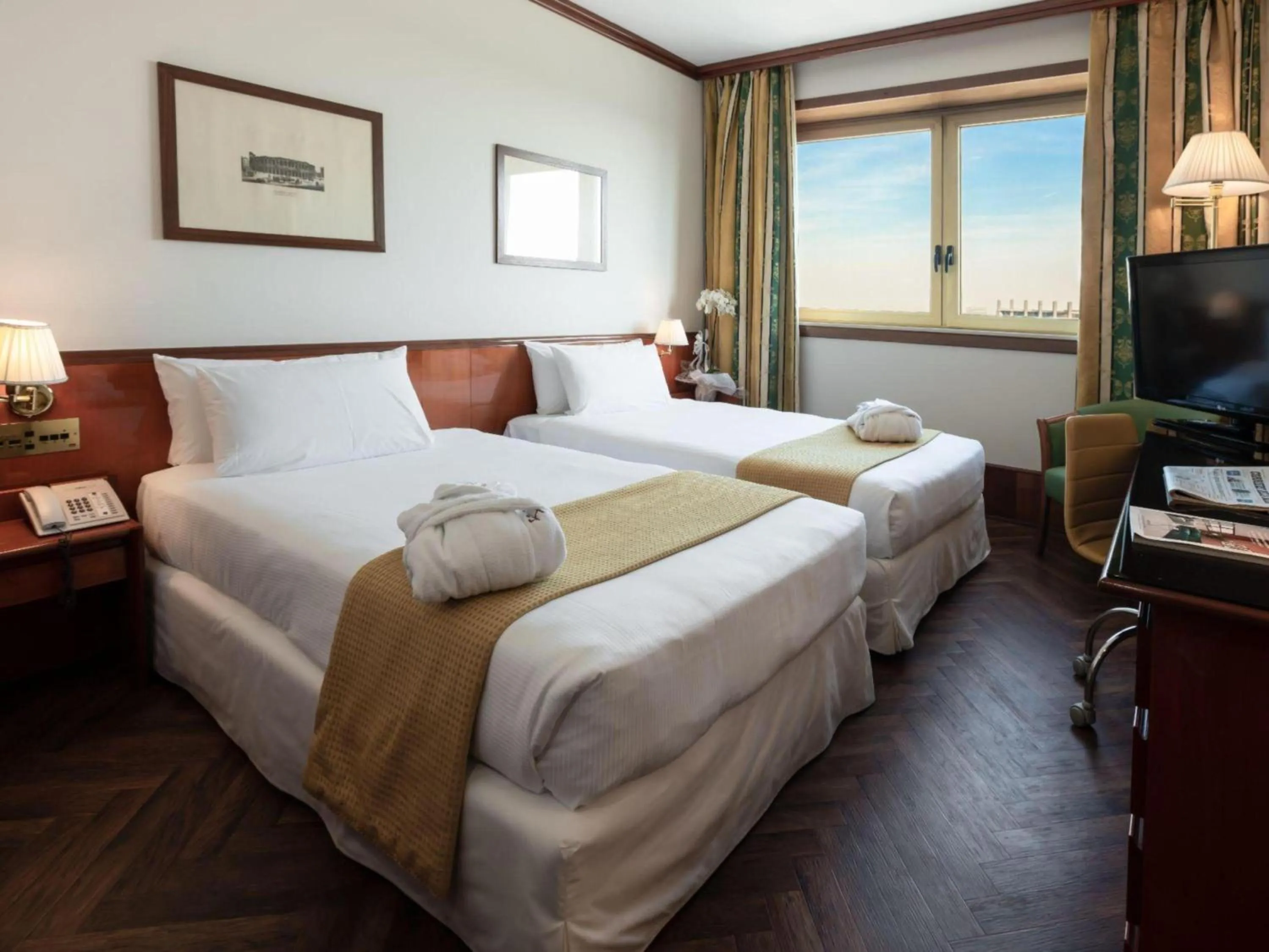 Bed in Hotel Catullo