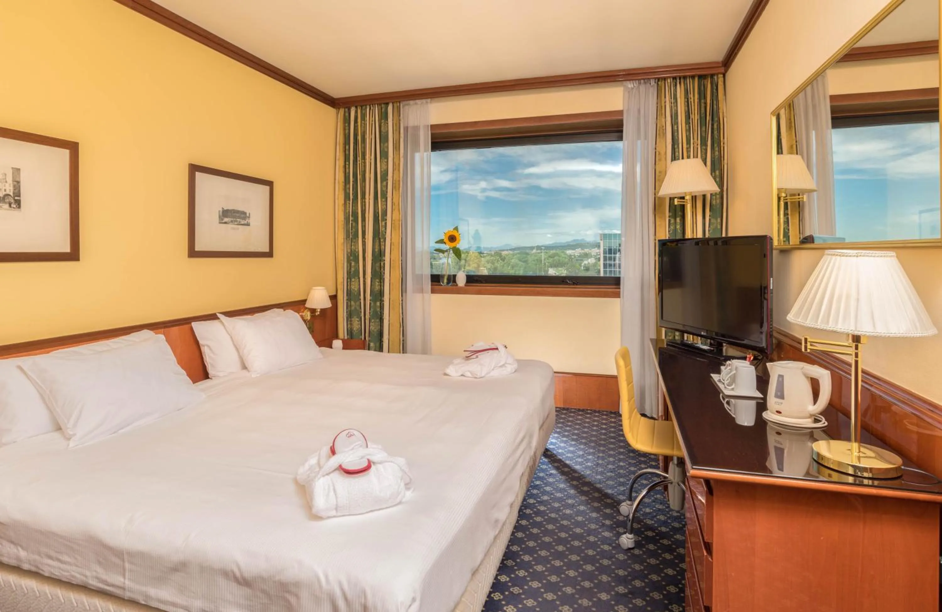 Bed in Hotel Catullo