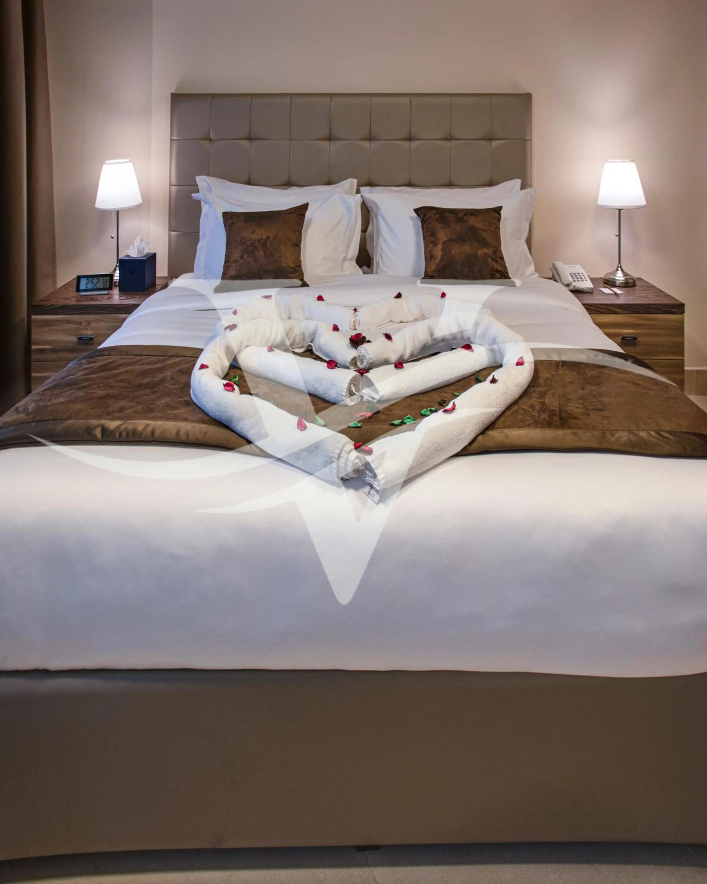 Bed in Viola Hotel Apartments