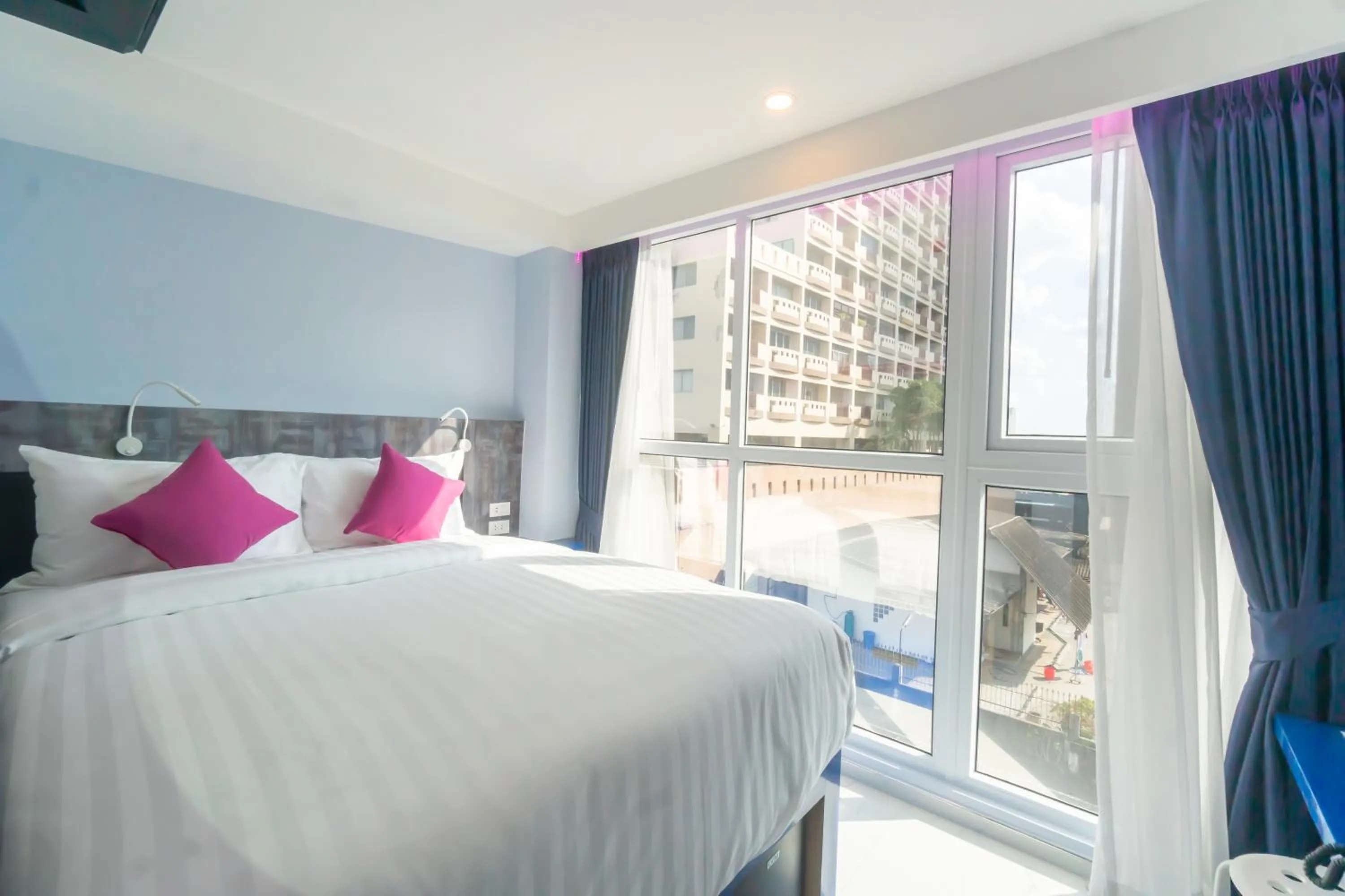 Bed in Spark Hotel - MRT Queen Sirikit - SHA Extra Plus Certified