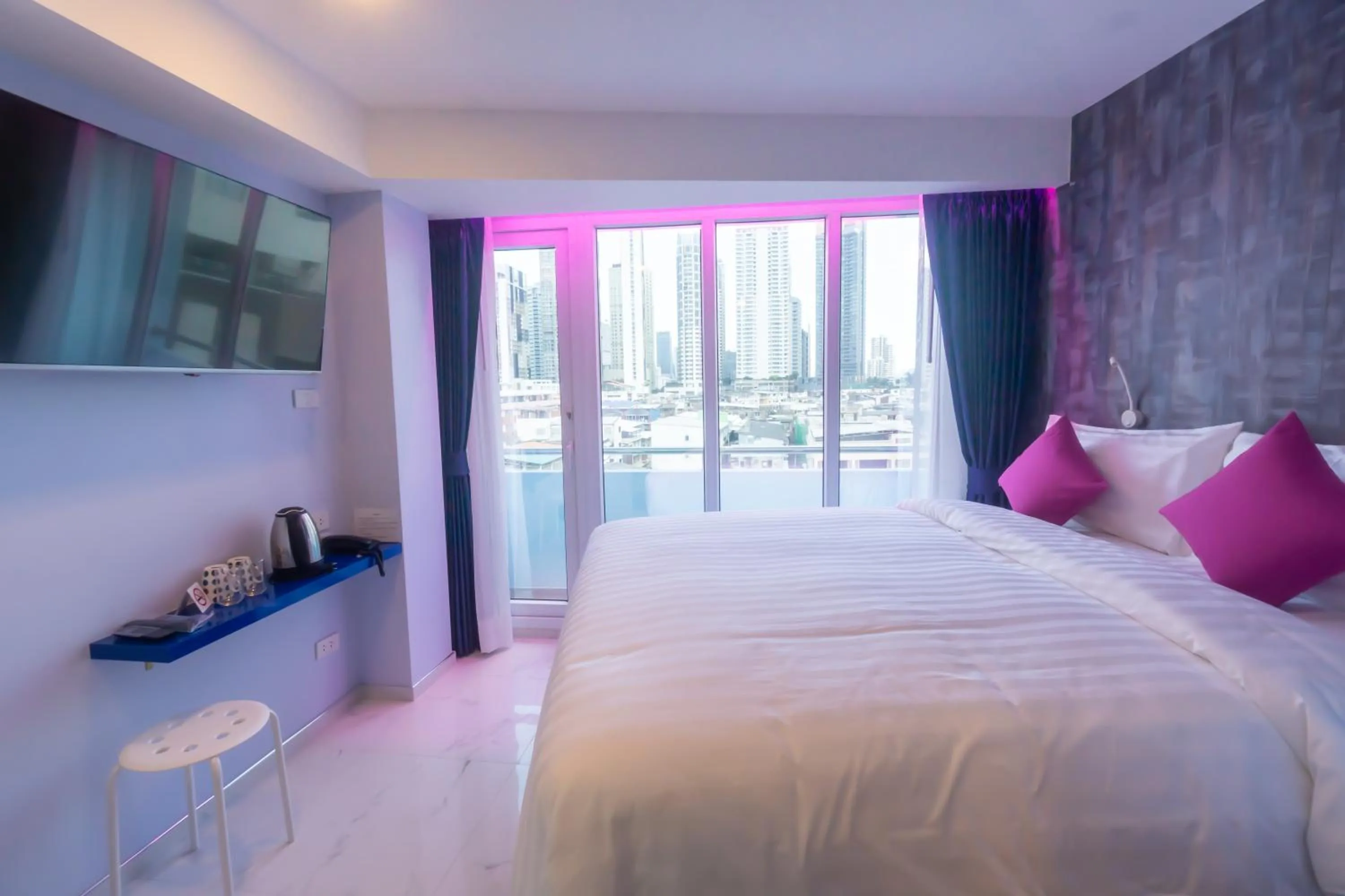 Bedroom, Bed in Spark Hotel - MRT Queen Sirikit - SHA Extra Plus Certified
