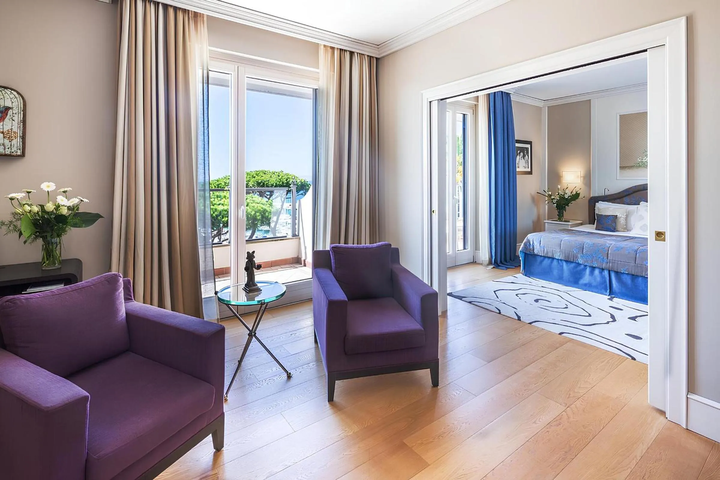 Seating area, Bed in Cala del Porto Punta Ala - Preferred Hotels