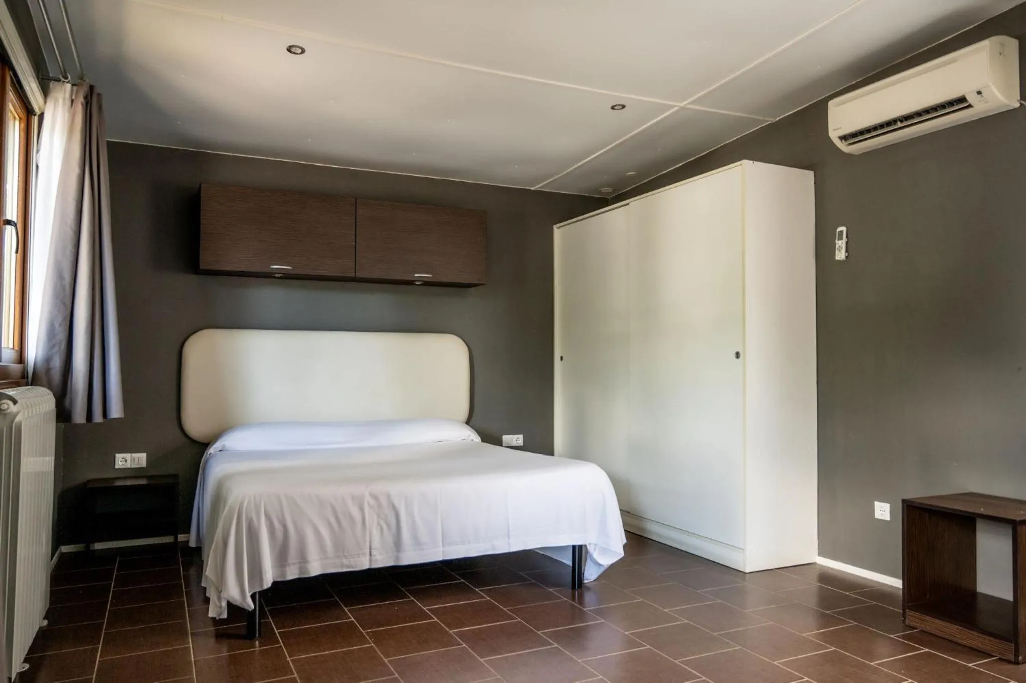 Bed in Flaminio Village Bungalow Park