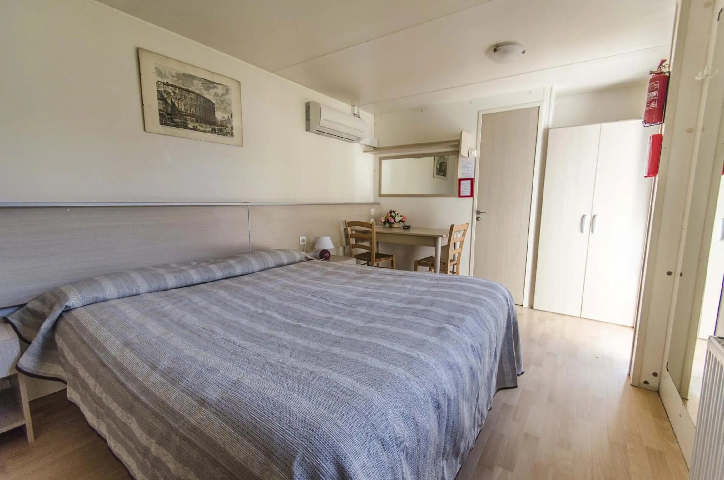 Photo of the whole room, Bed in Flaminio Village Bungalow Park