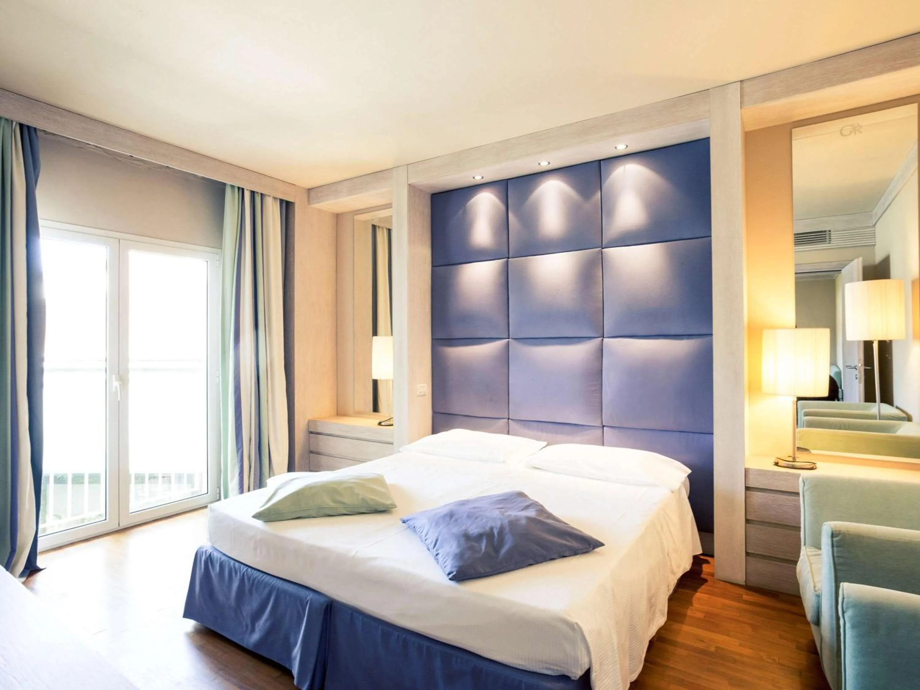 Photo of the whole room, Bed in TH Tirrenia - Green Park Resort