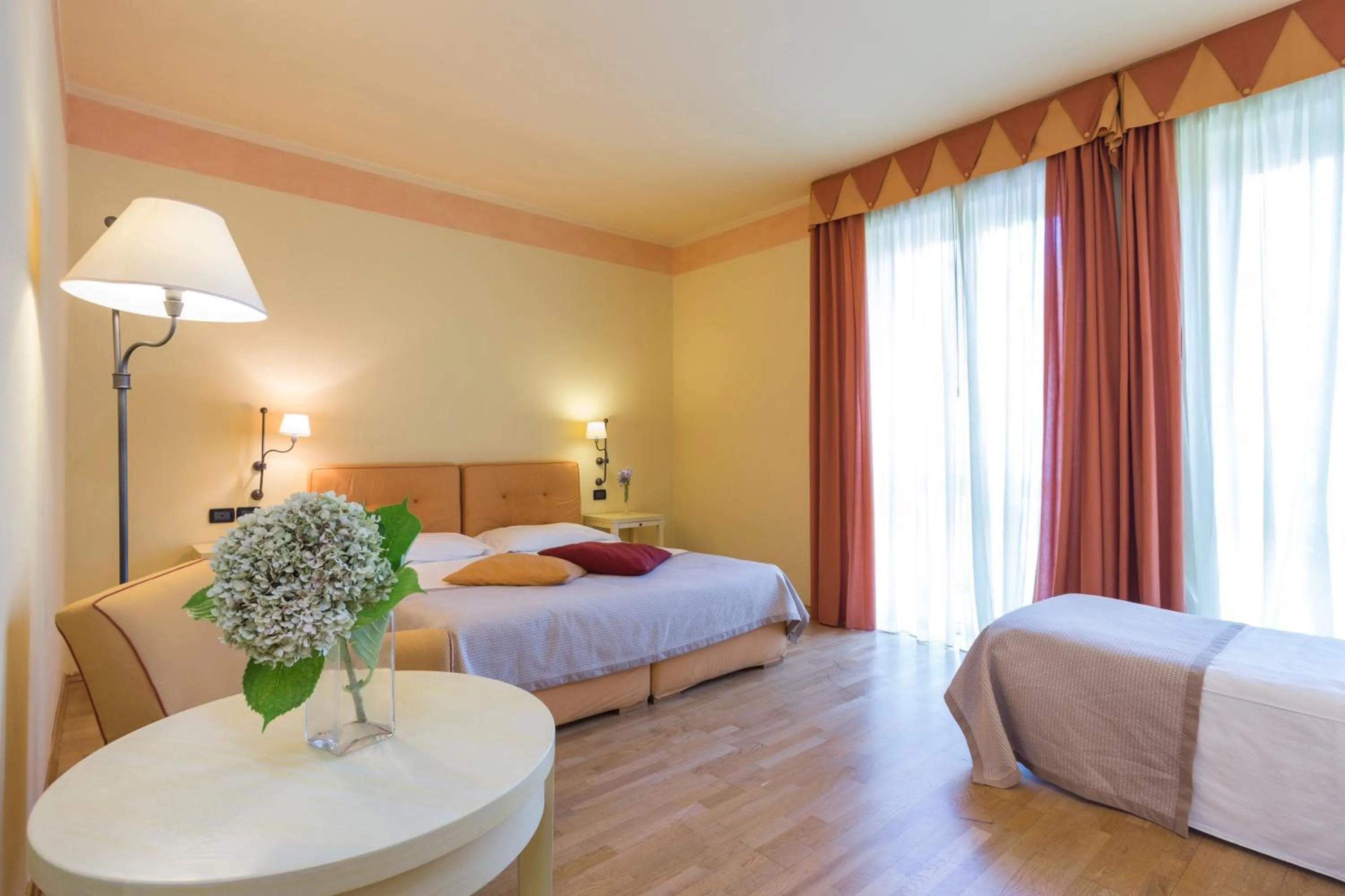 Photo of the whole room, Bed in TH Tirrenia - Green Park Resort