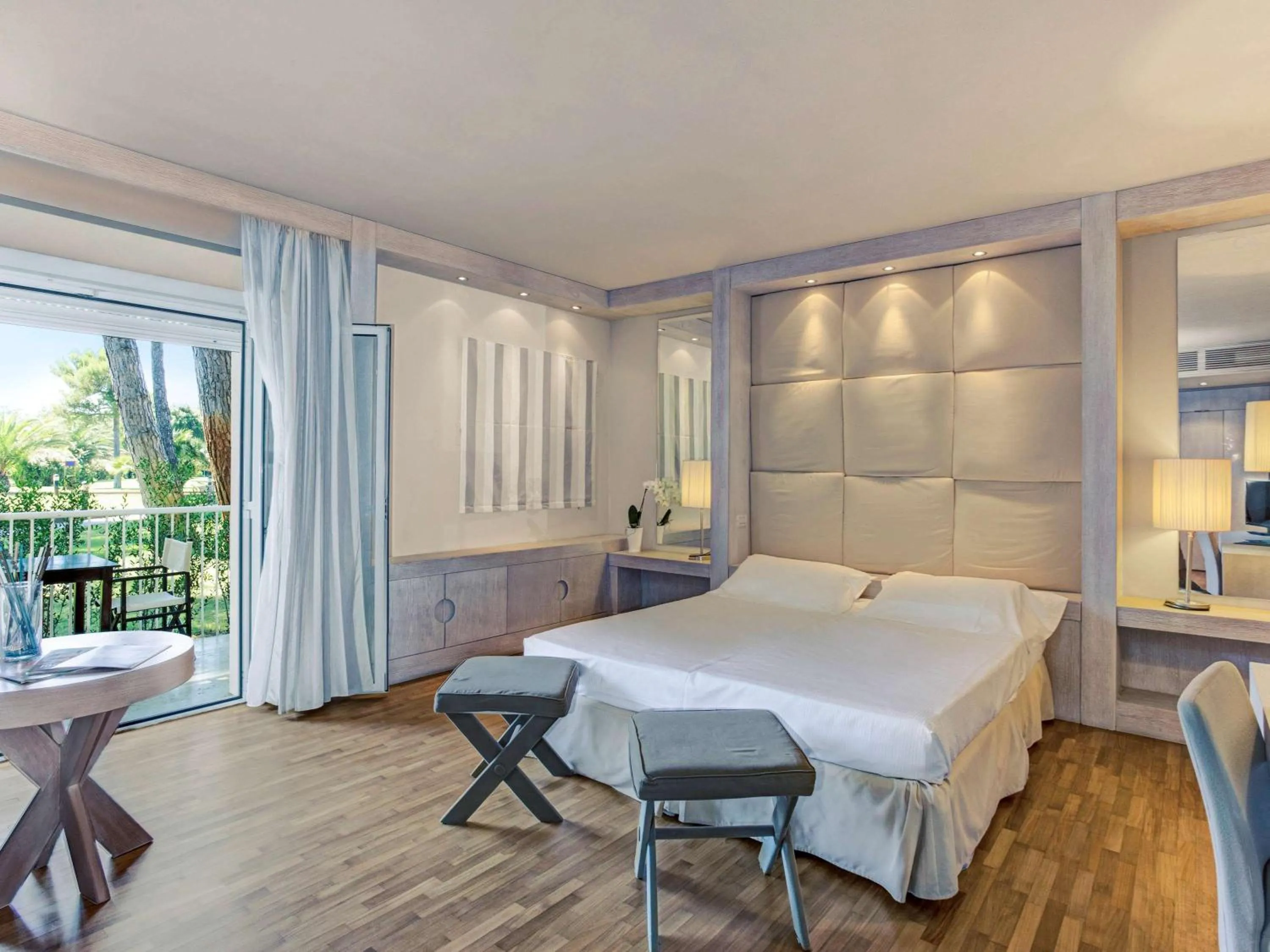 Photo of the whole room, Bed in TH Tirrenia - Green Park Resort