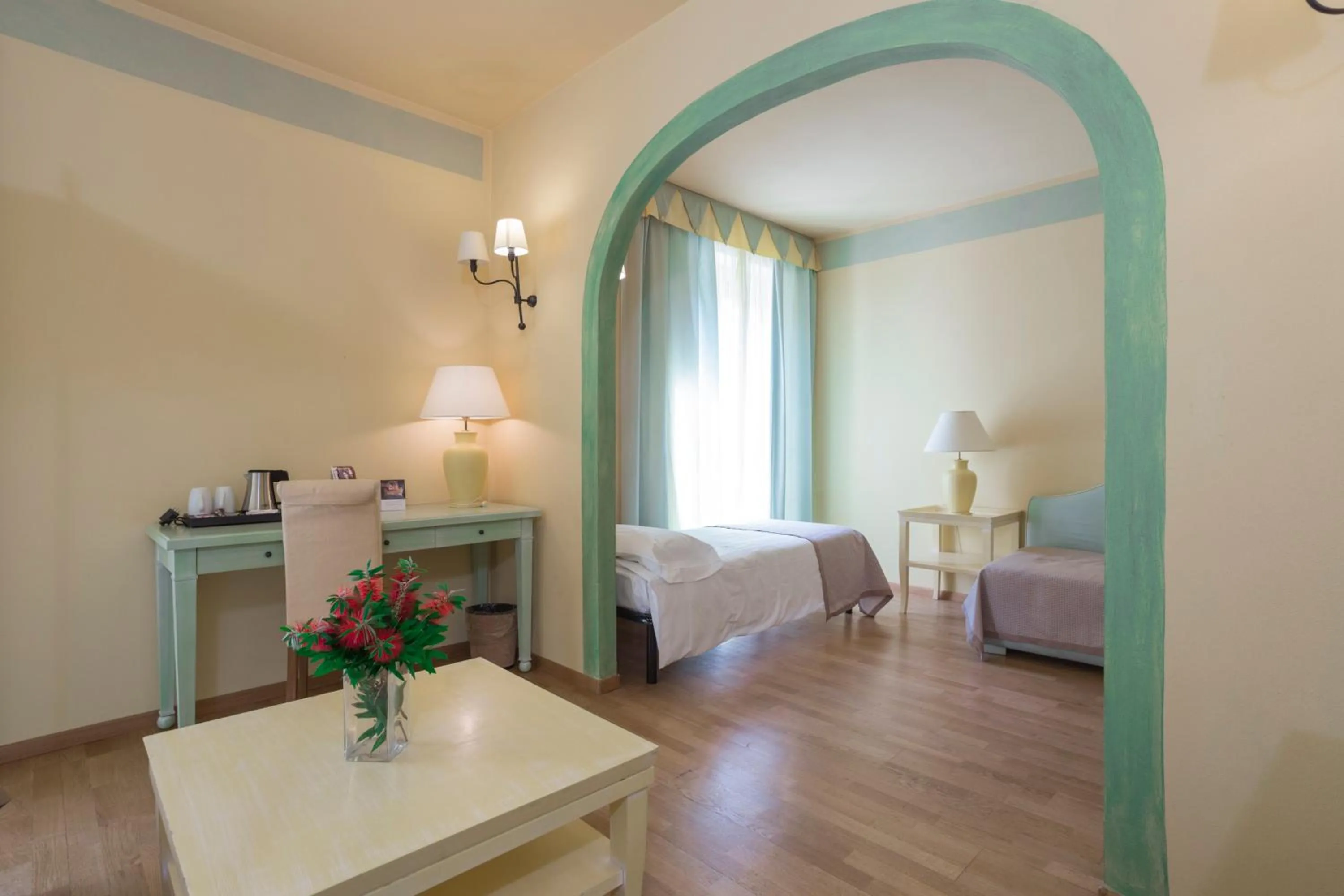 Photo of the whole room, Bed in TH Tirrenia - Green Park Resort