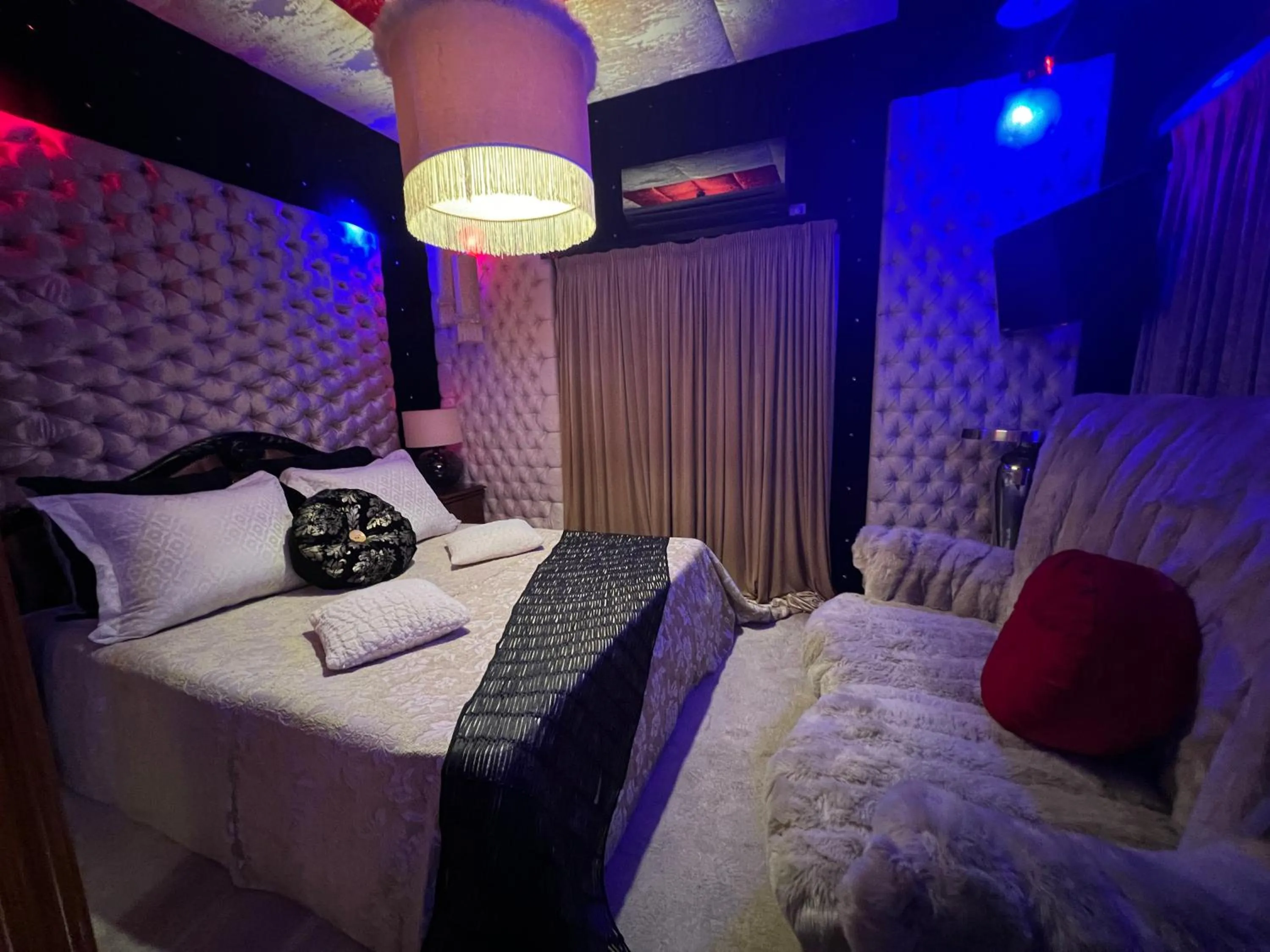 Bed in Xcite Hotel Salem