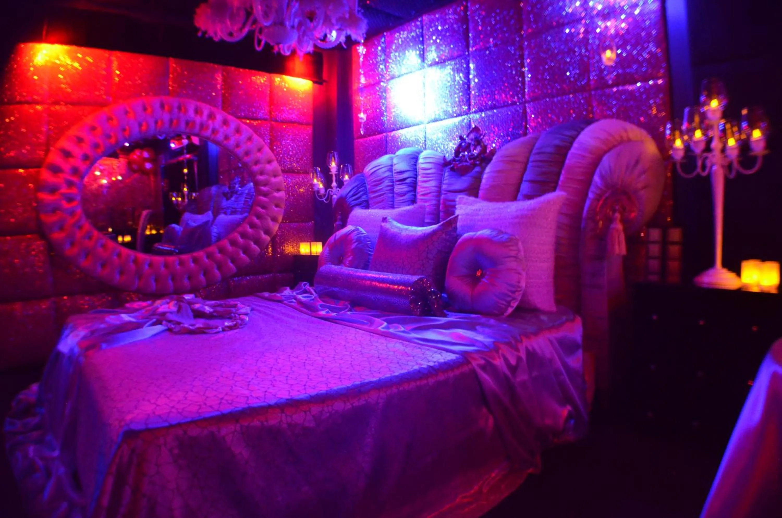 Bed in Xcite Hotel Salem