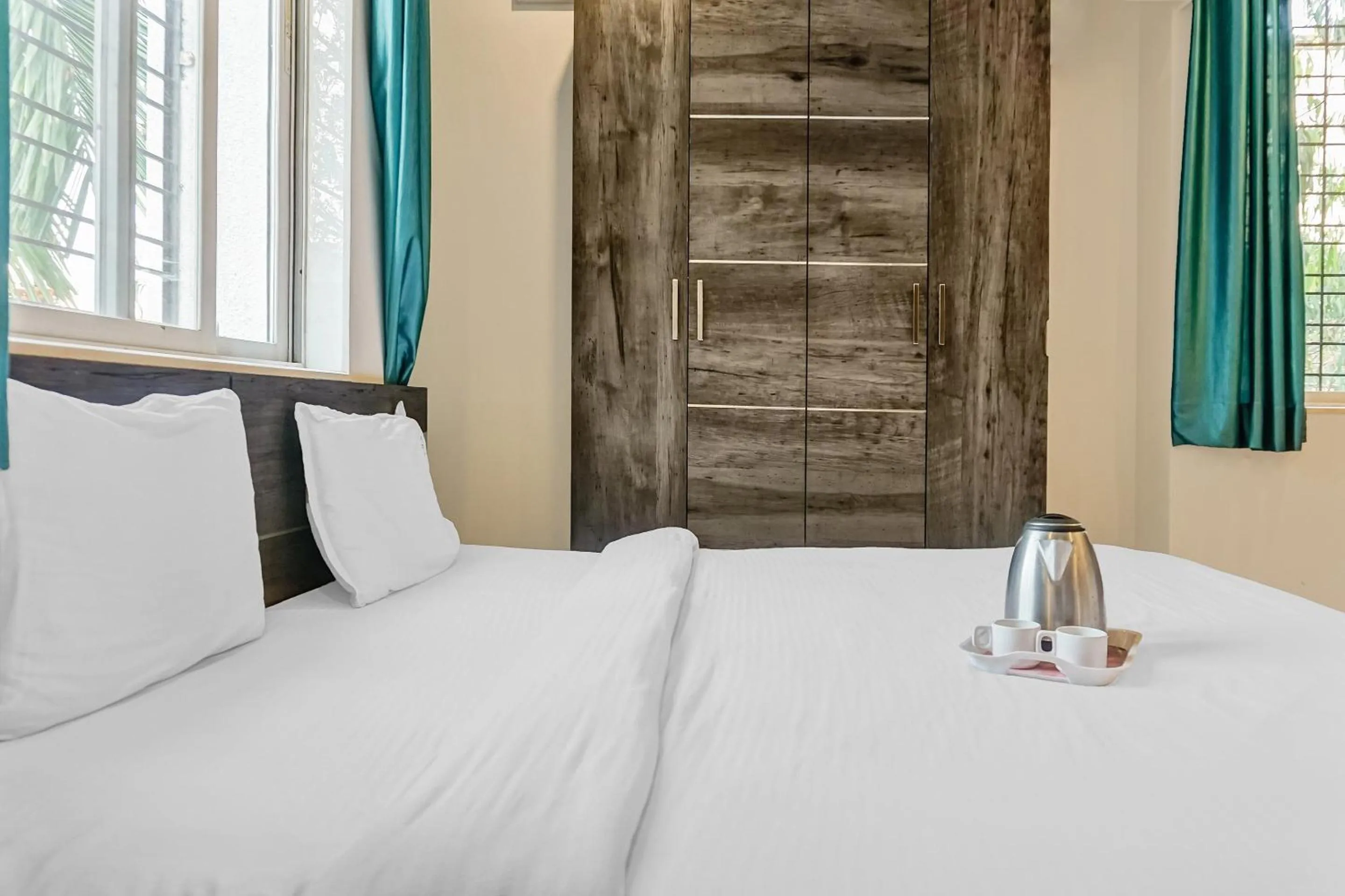 Bedroom, Bed in Super Townhouse The Upper Room Near Pune Airport