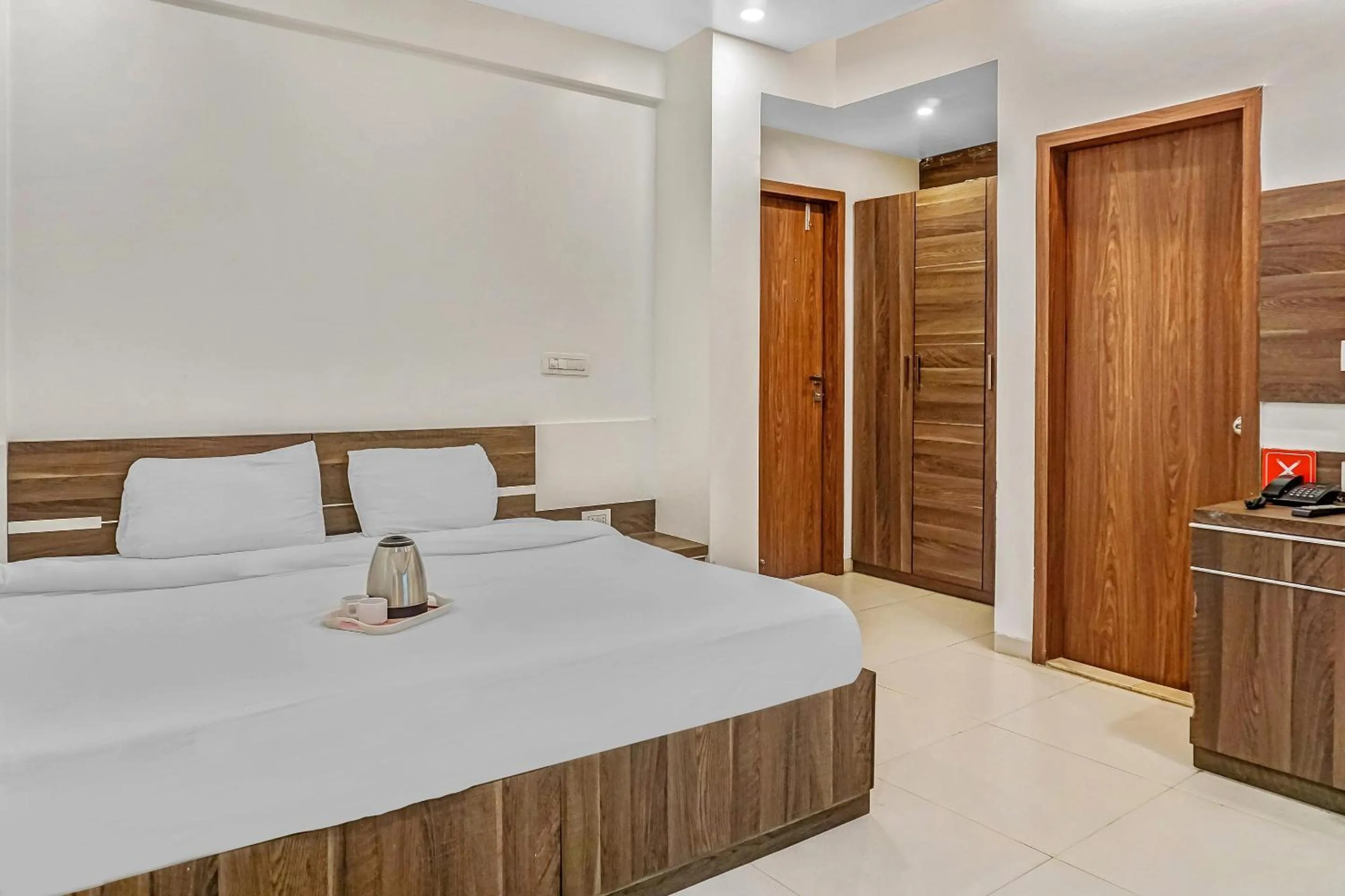 Bedroom, Bed in Super Townhouse The Upper Room Near Pune Airport