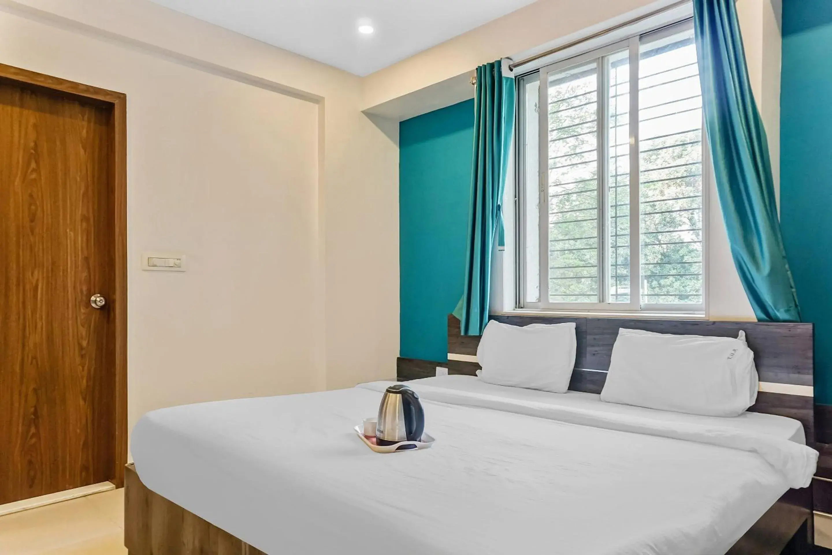 Bedroom, Bed in Super Townhouse The Upper Room Near Pune Airport Bedroom, Bed in Super Townhouse The Upper Room Near Pune Airport
