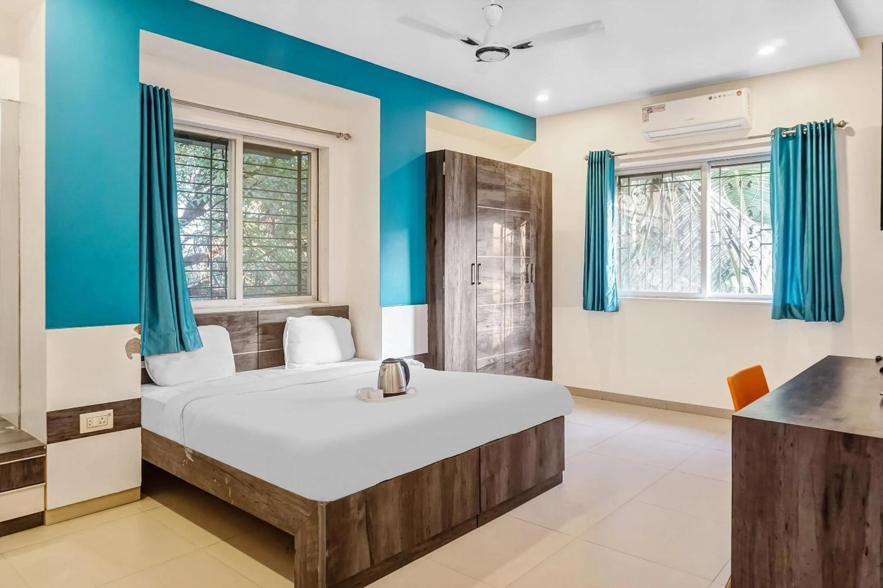 Bedroom, Bed in Super Townhouse The Upper Room Near Pune Airport
