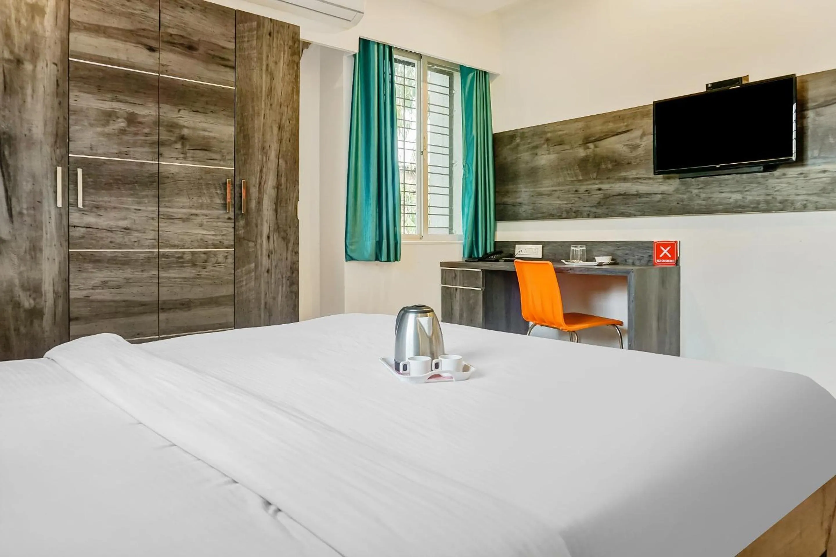 Bedroom, Bed in Super Townhouse The Upper Room Near Pune Airport