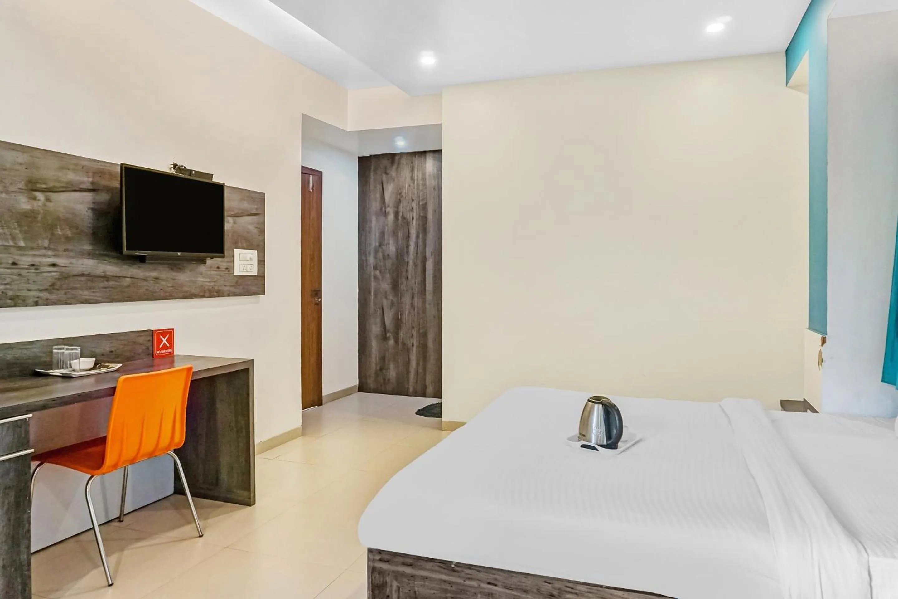 Bedroom, Bed in Super Townhouse The Upper Room Near Pune Airport