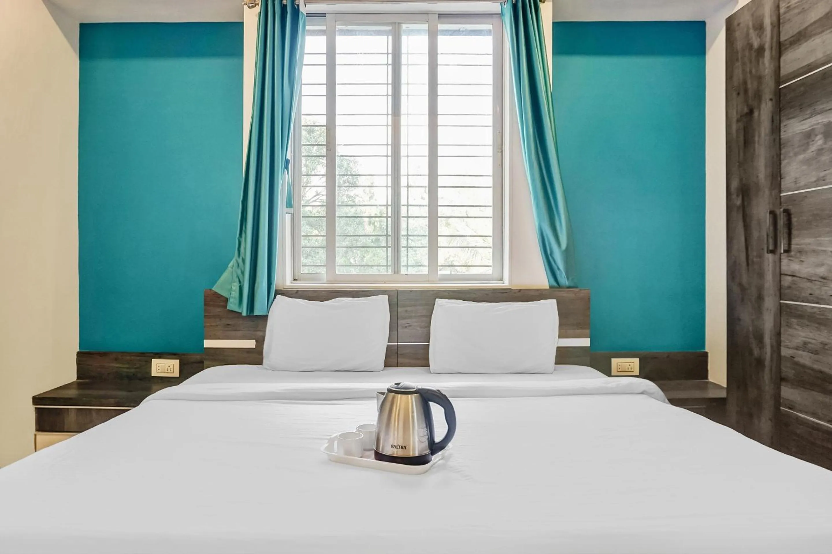 Bedroom, Bed in Super Townhouse The Upper Room Near Pune Airport