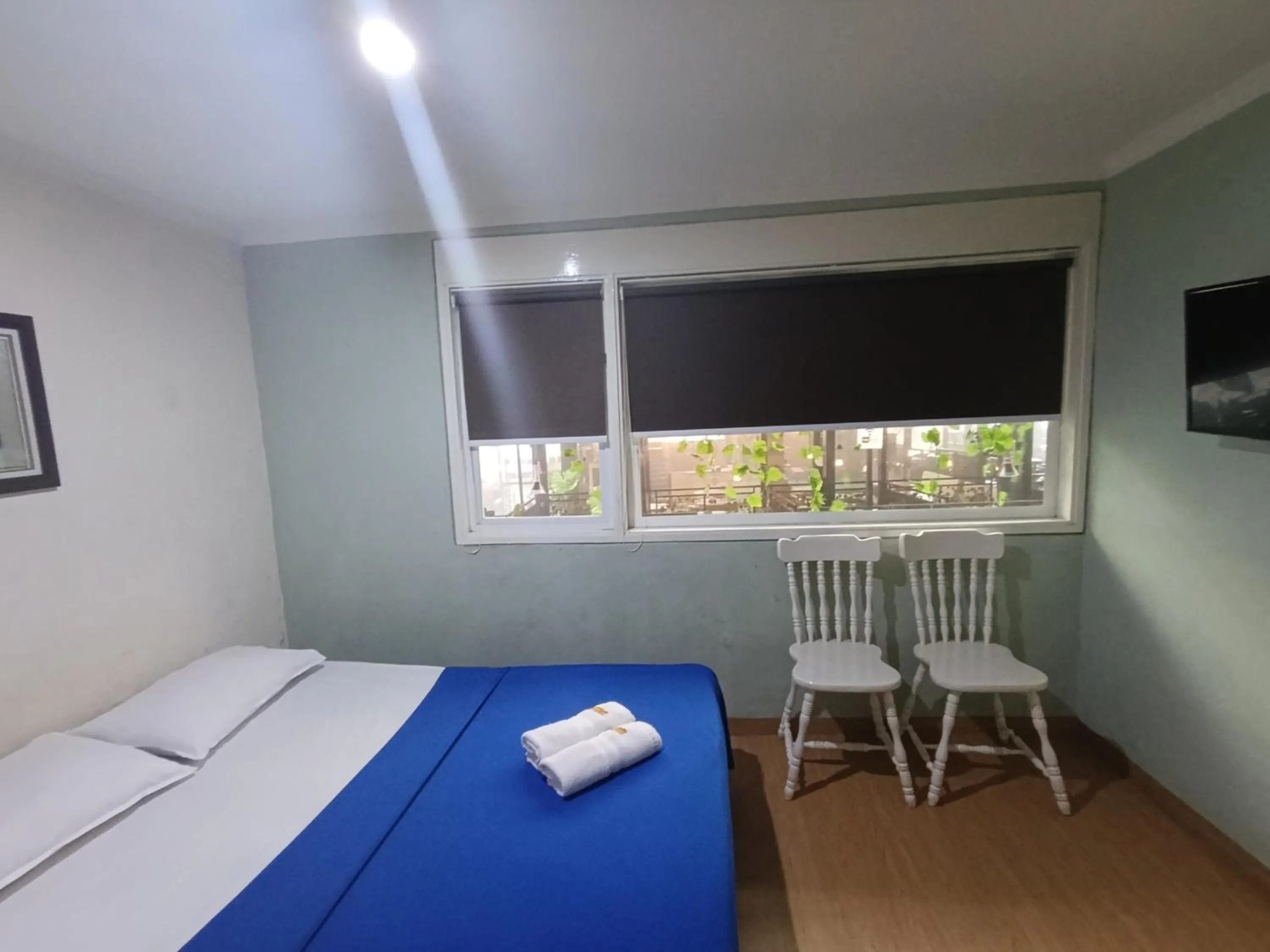 Bed in Mamifokobo Guest House