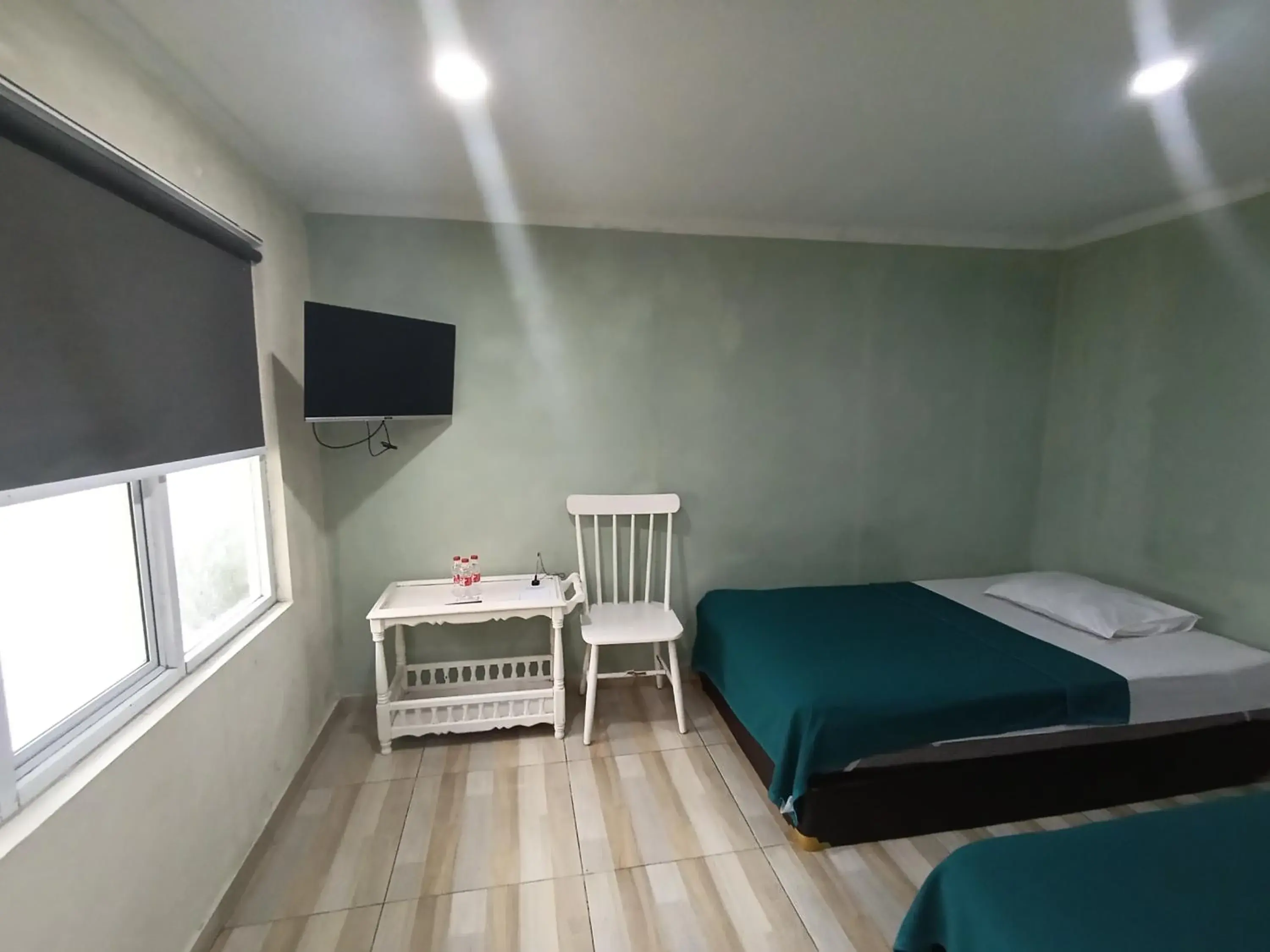 Bed in Mamifokobo Guest House Bed in Mamifokobo Guest House