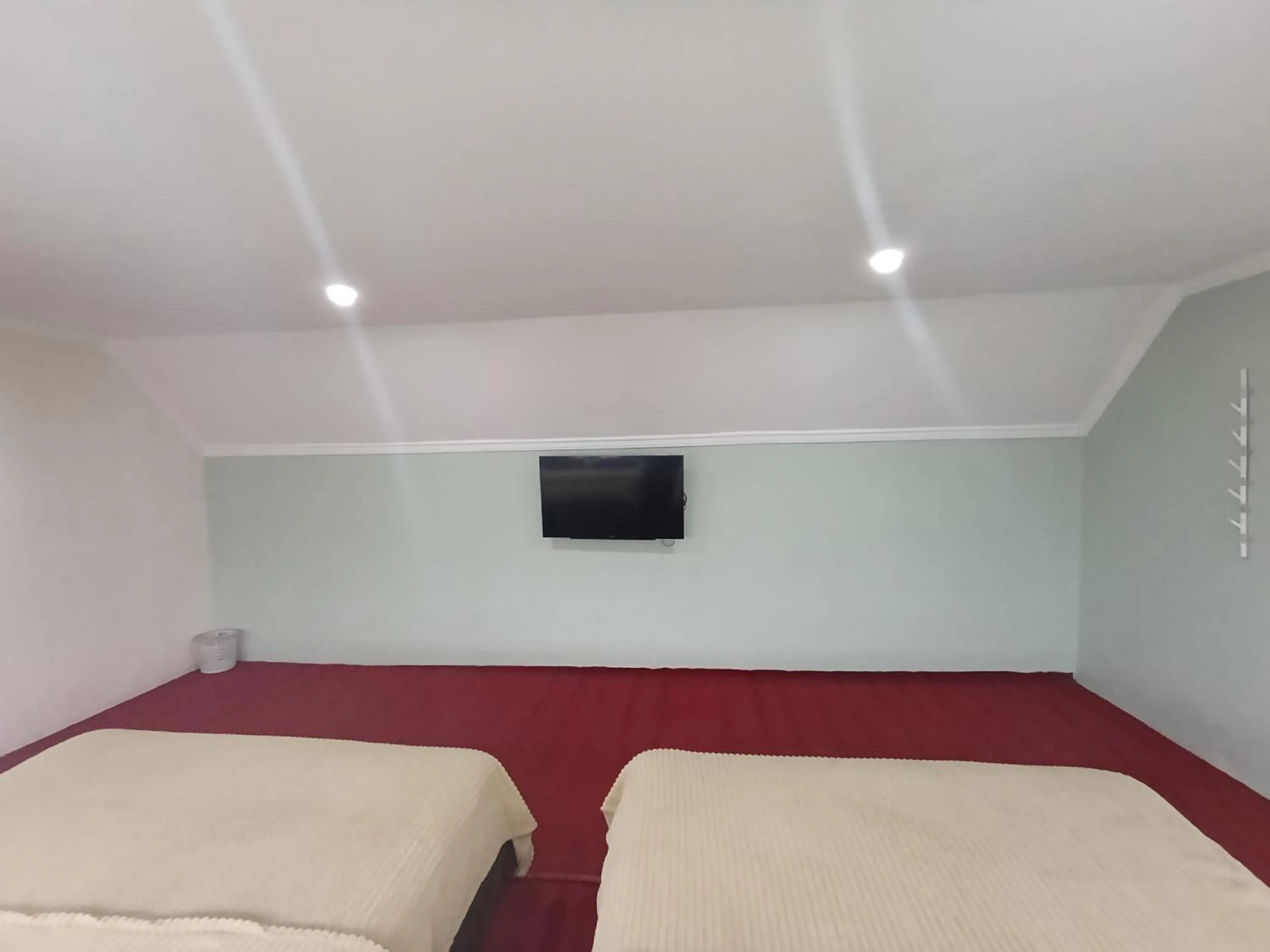 Bed in Mamifokobo Guest House