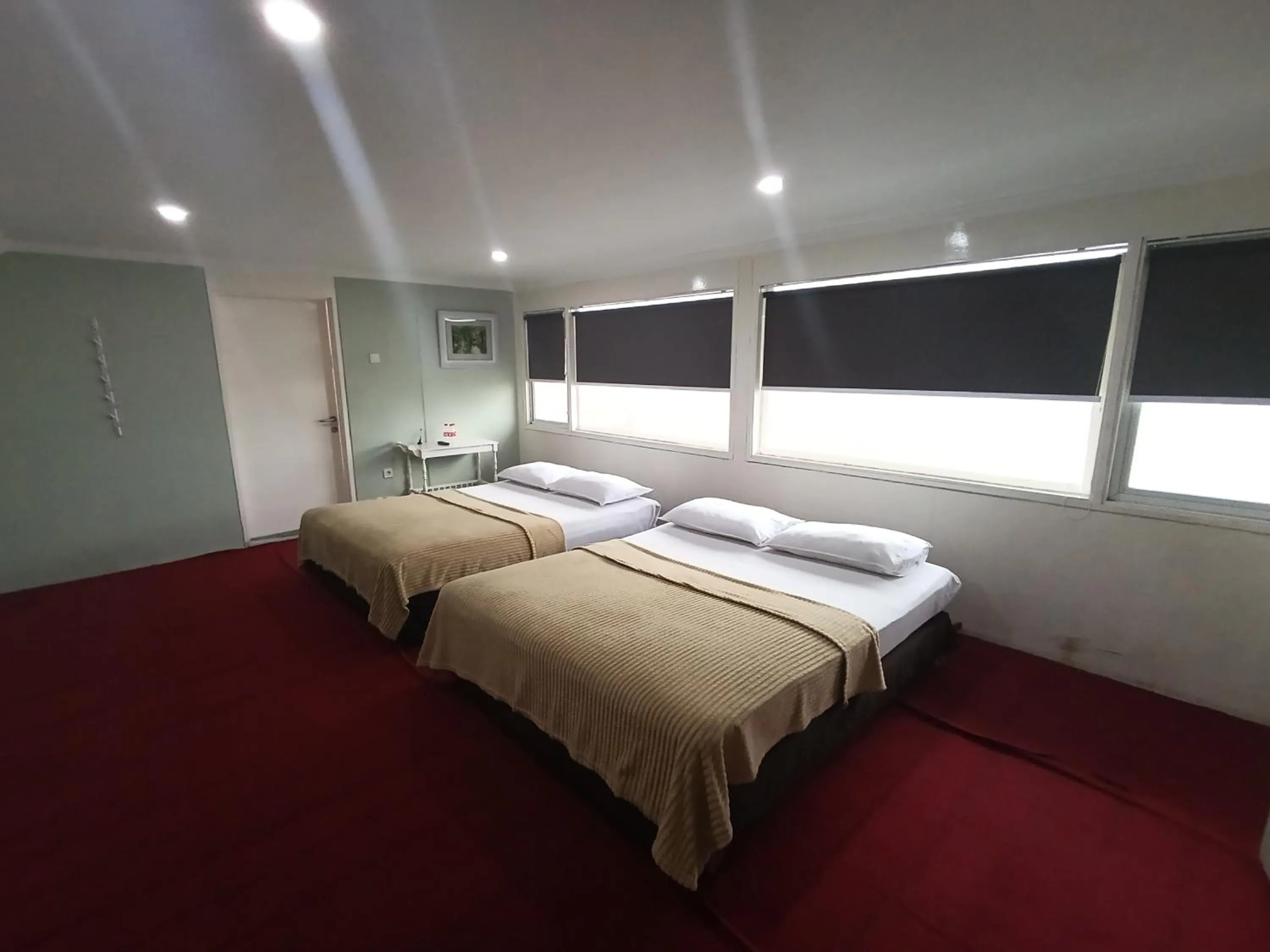 Bed in Mamifokobo Guest House