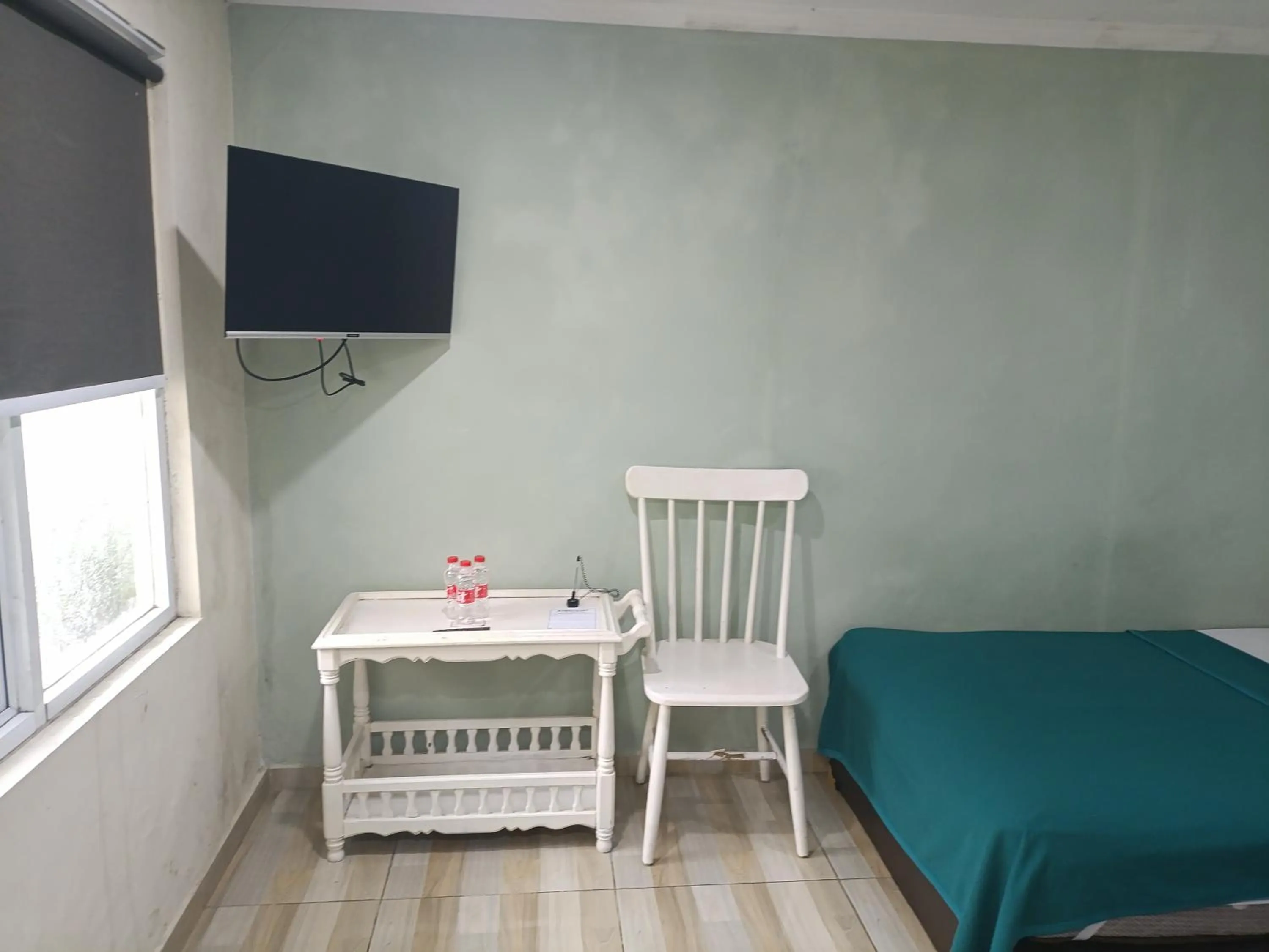 Bed in Mamifokobo Guest House