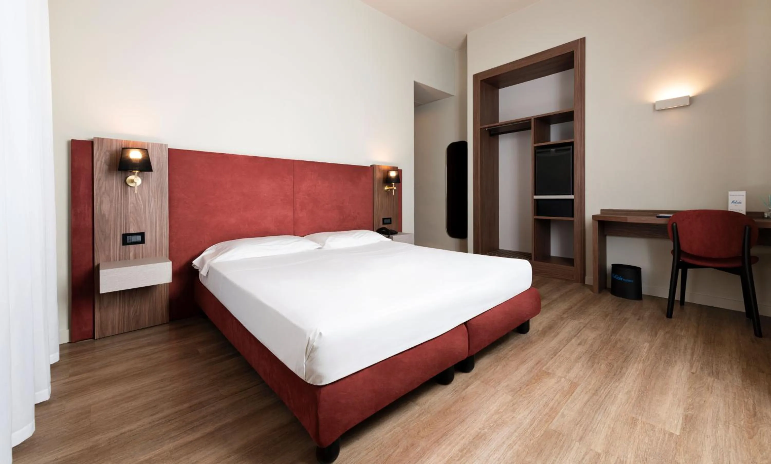 Bed in Mokinba Hotels Montebianco