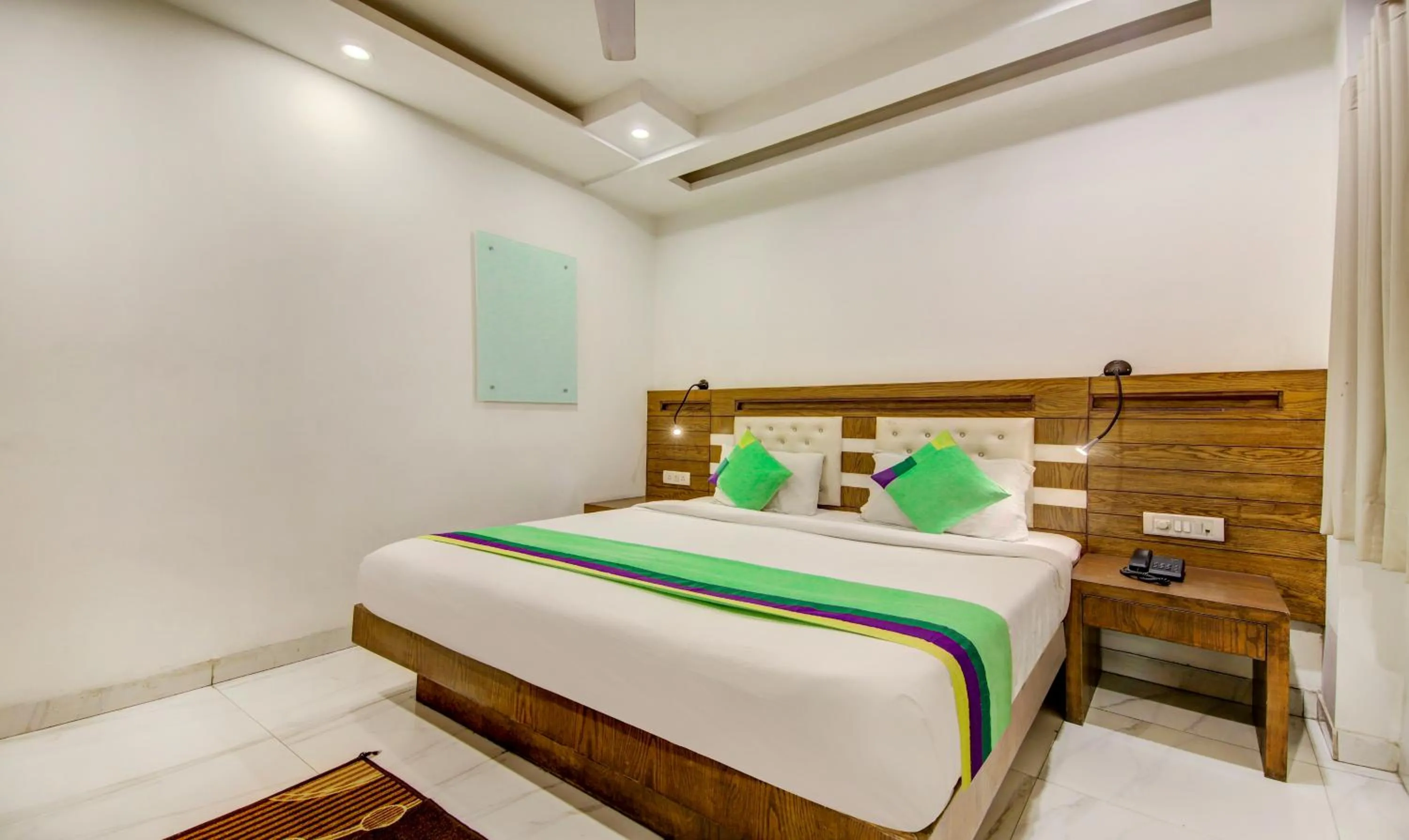 Bedroom, Bed in Treebo The Kings Plaza