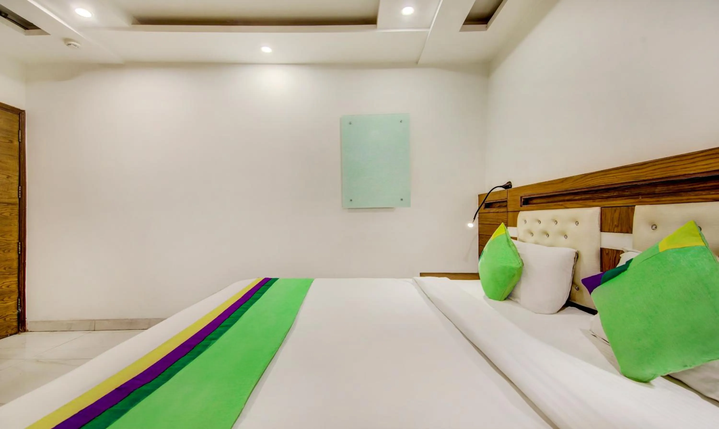 Bedroom, Bed in Treebo The Kings Plaza