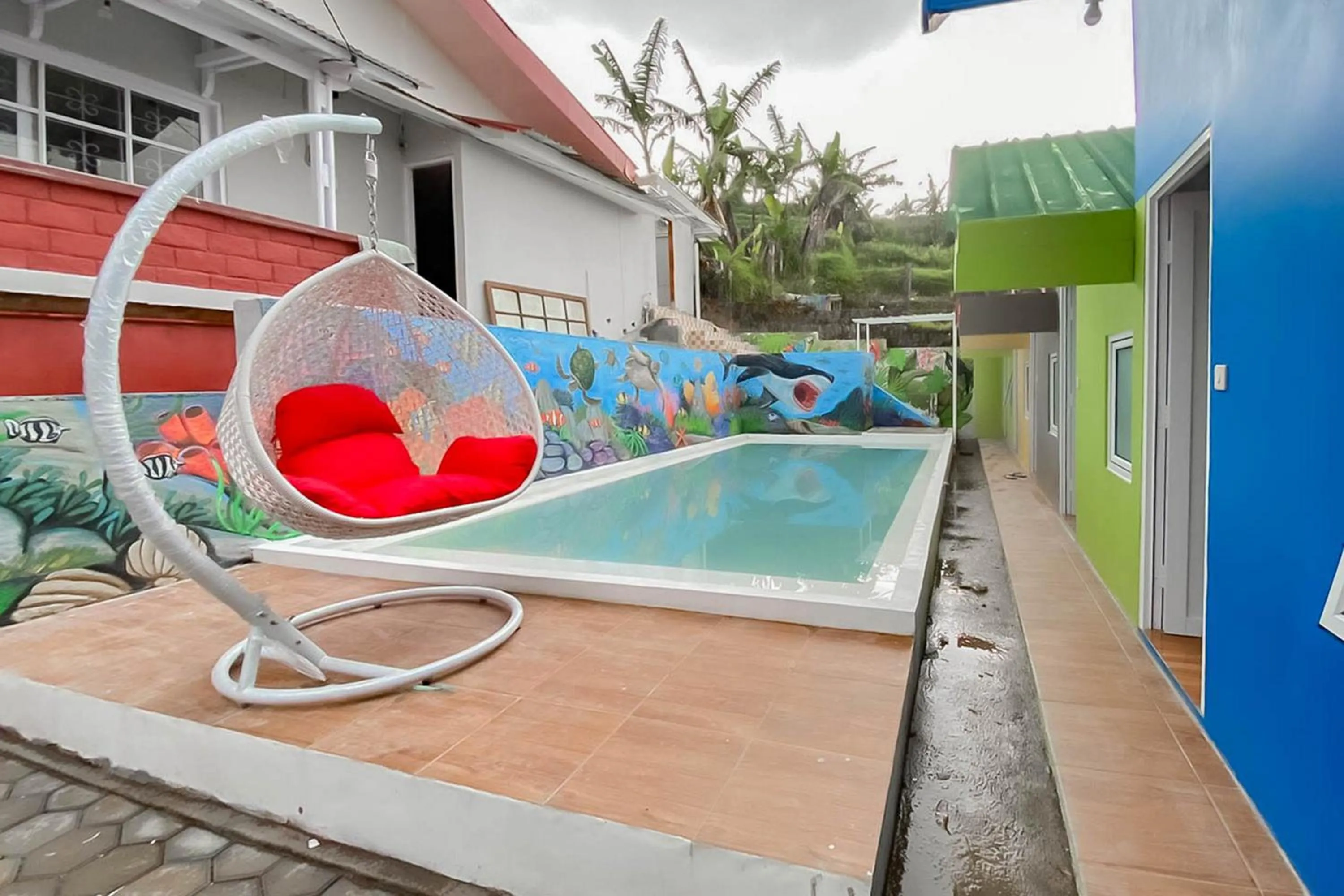 Swimming pool in RedDoorz Syariah Plus At Cipanas Cianjur