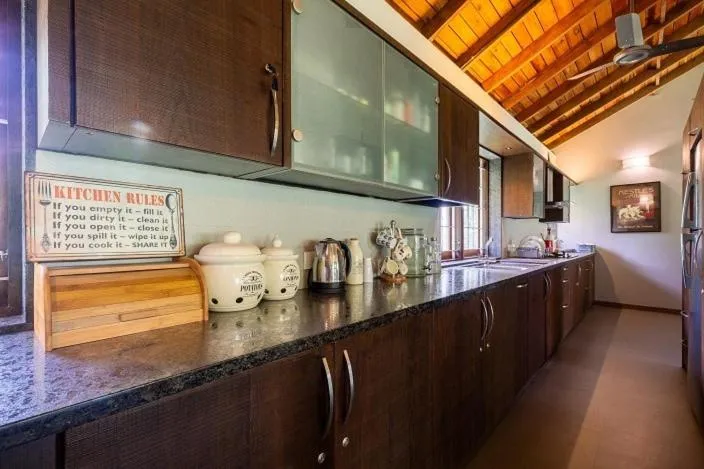 Kitchen or kitchenette in amã Stays & Trails - The Old Cattleshed, Wayanad