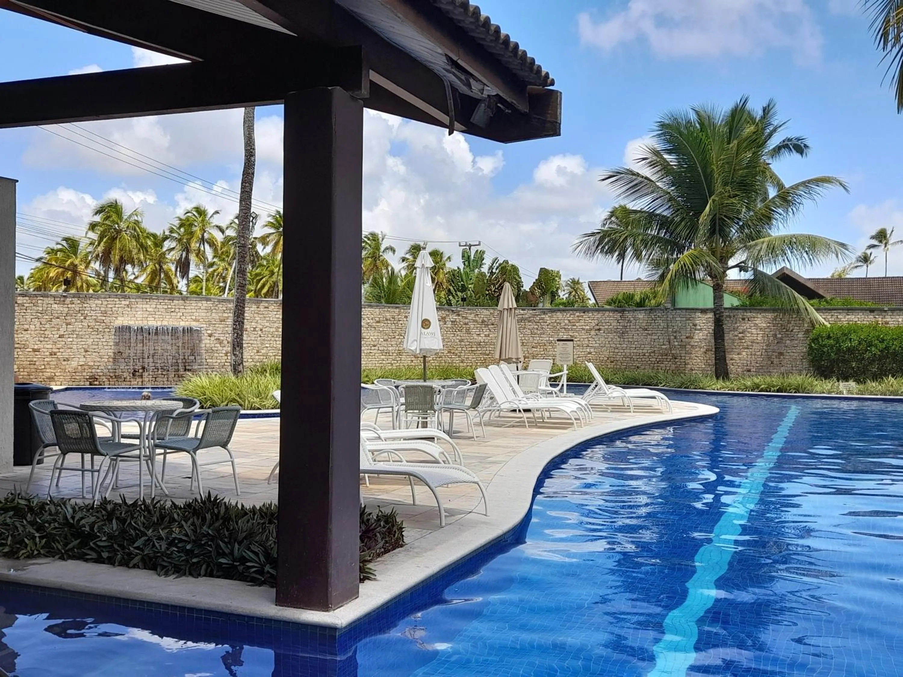 Swimming pool in Aconchegante Flat em condomínio na beira mar de Muro Alto - Malawi Beach Resort